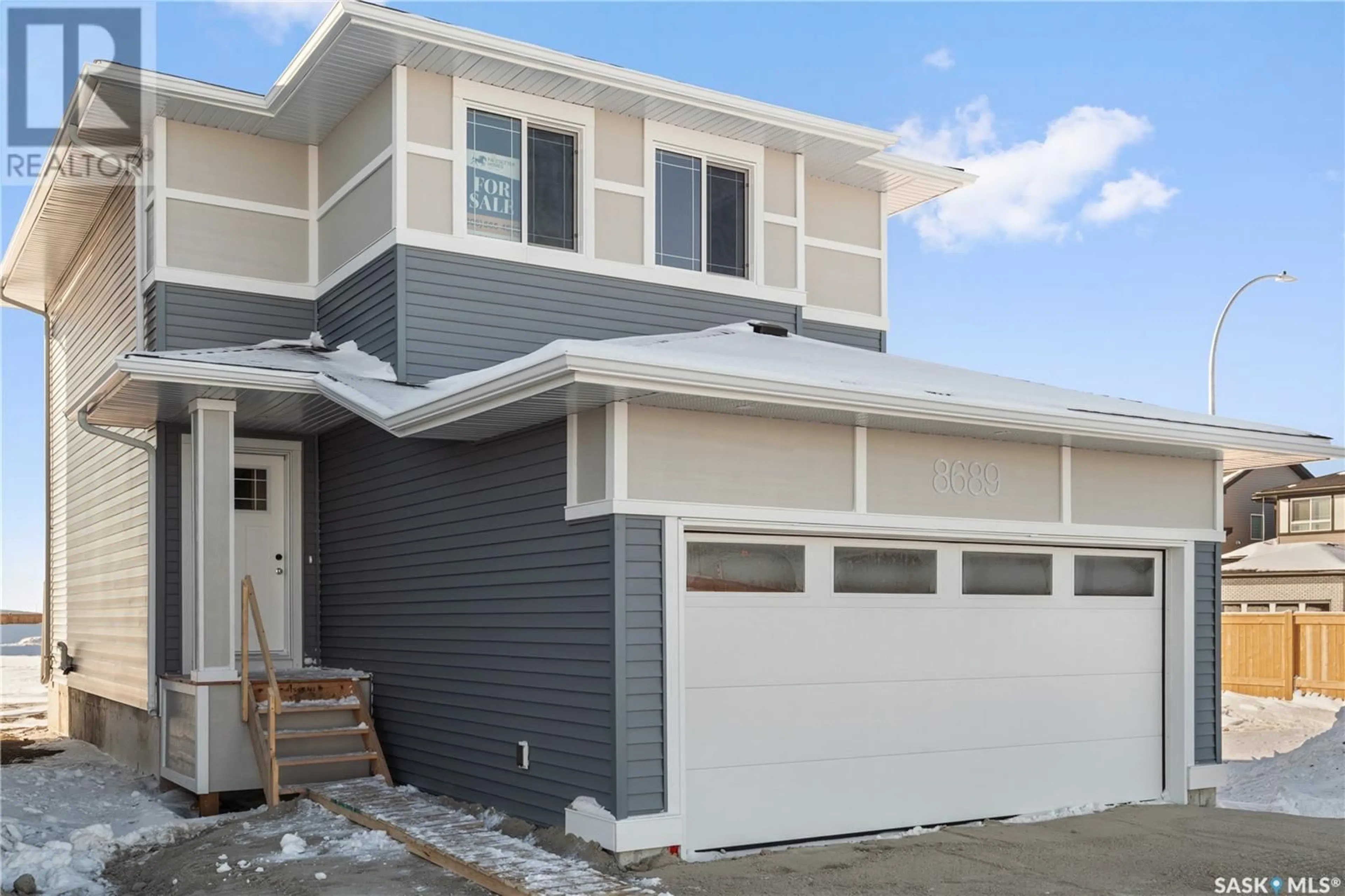 Home with vinyl exterior material, street for 8689 Wheat CRESCENT, Regina Saskatchewan S4Y0H4