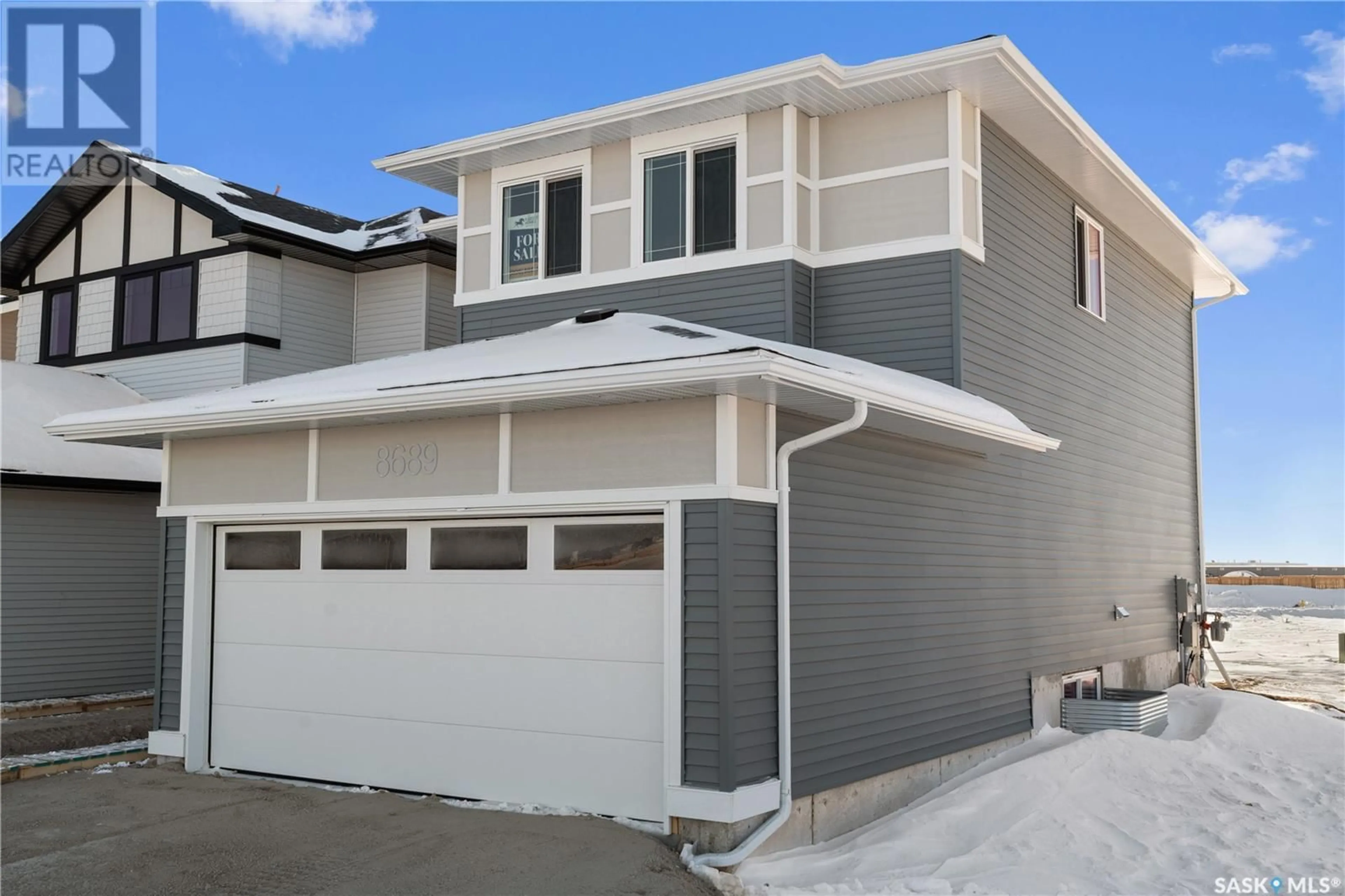 Home with vinyl exterior material, street for 8689 Wheat CRESCENT, Regina Saskatchewan S4Y0H4