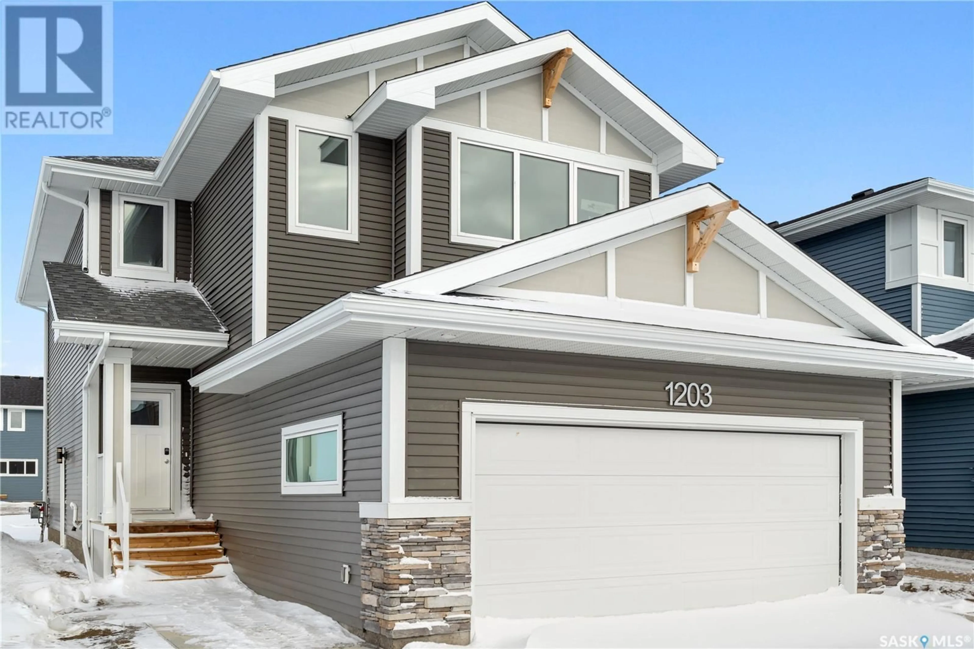Home with vinyl exterior material, street for 1203 CAMDEN GARDENS, White City Saskatchewan S4L3G5