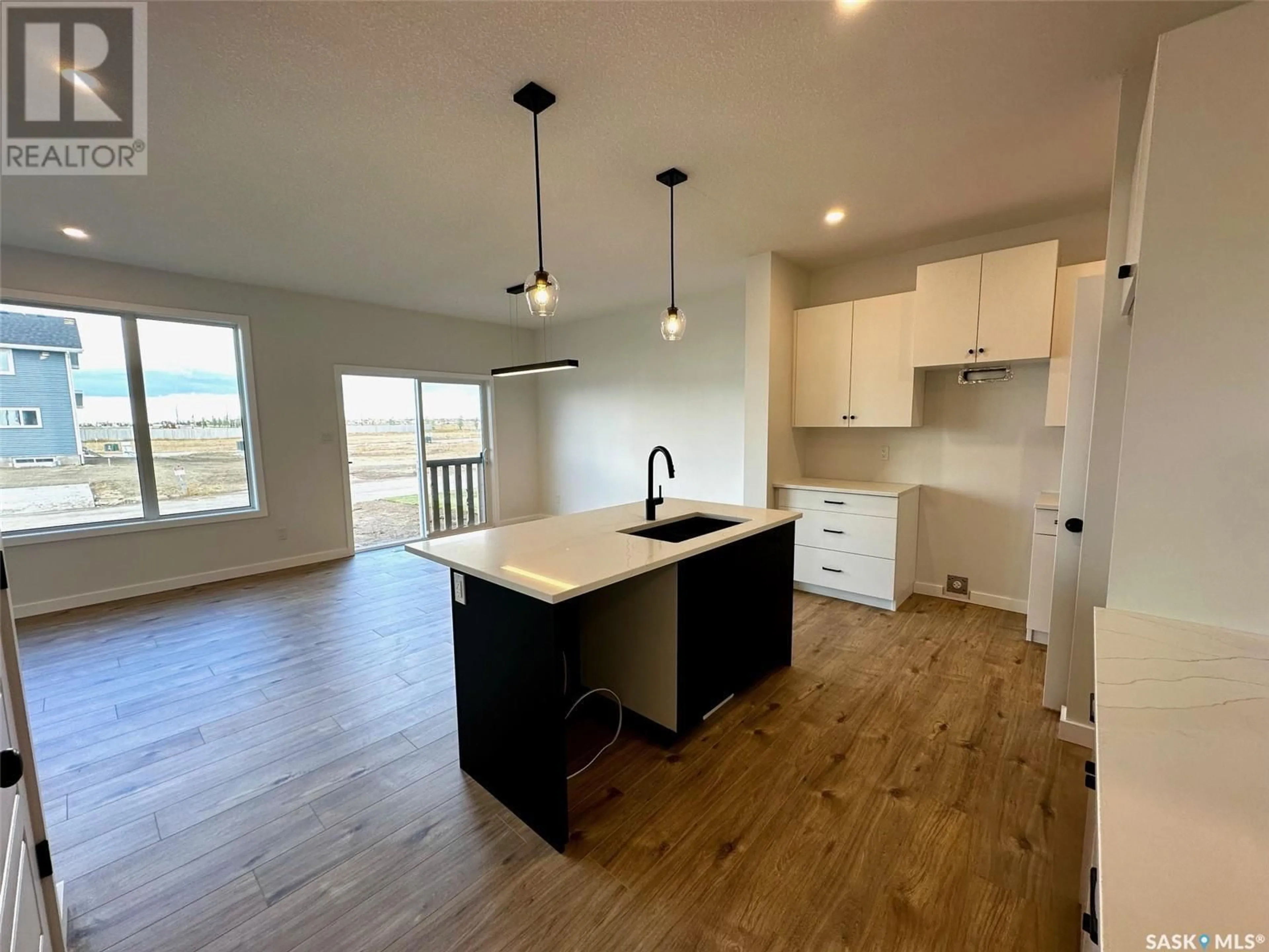 Open concept kitchen, unknown for 1203 Camden GARDENS, White City Saskatchewan S4L3G5