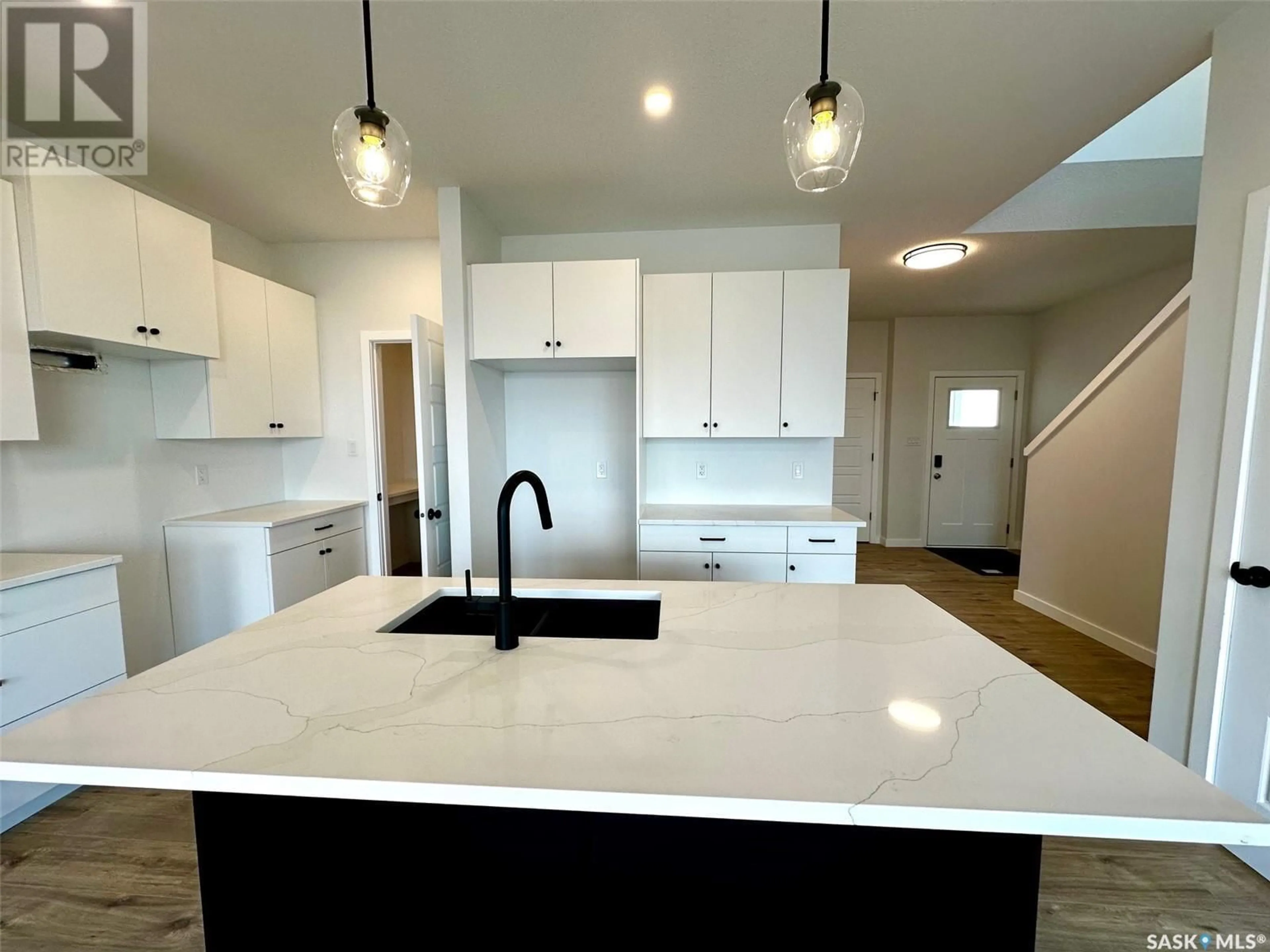 Open concept kitchen, unknown for 1203 Camden GARDENS, White City Saskatchewan S4L3G5