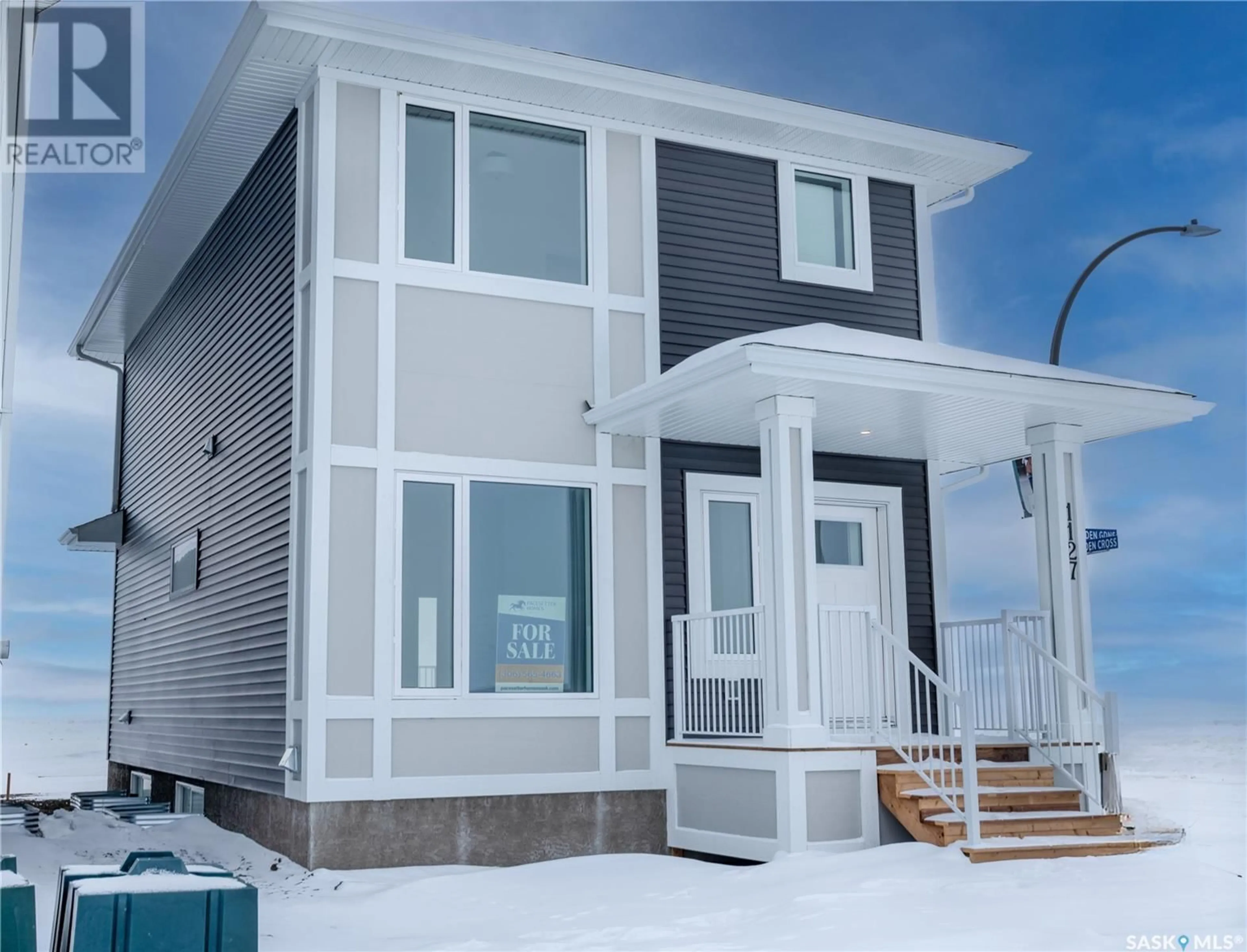 Home with vinyl exterior material, street for 1127 Camden GARDENS, White City Saskatchewan S4L3R5