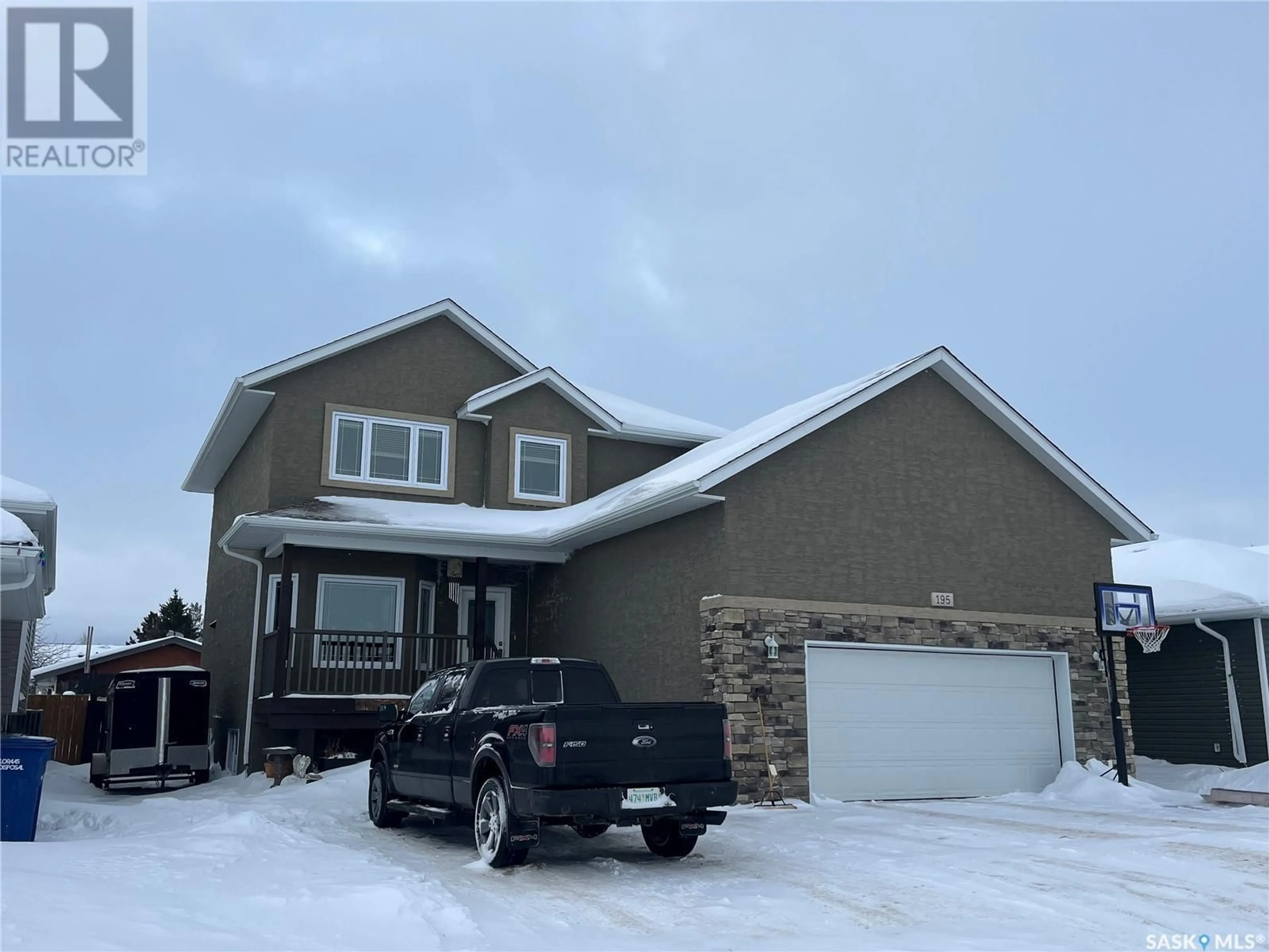 Home with vinyl exterior material, street for 195 5TH AVENUE, Esterhazy Saskatchewan S0A0X0