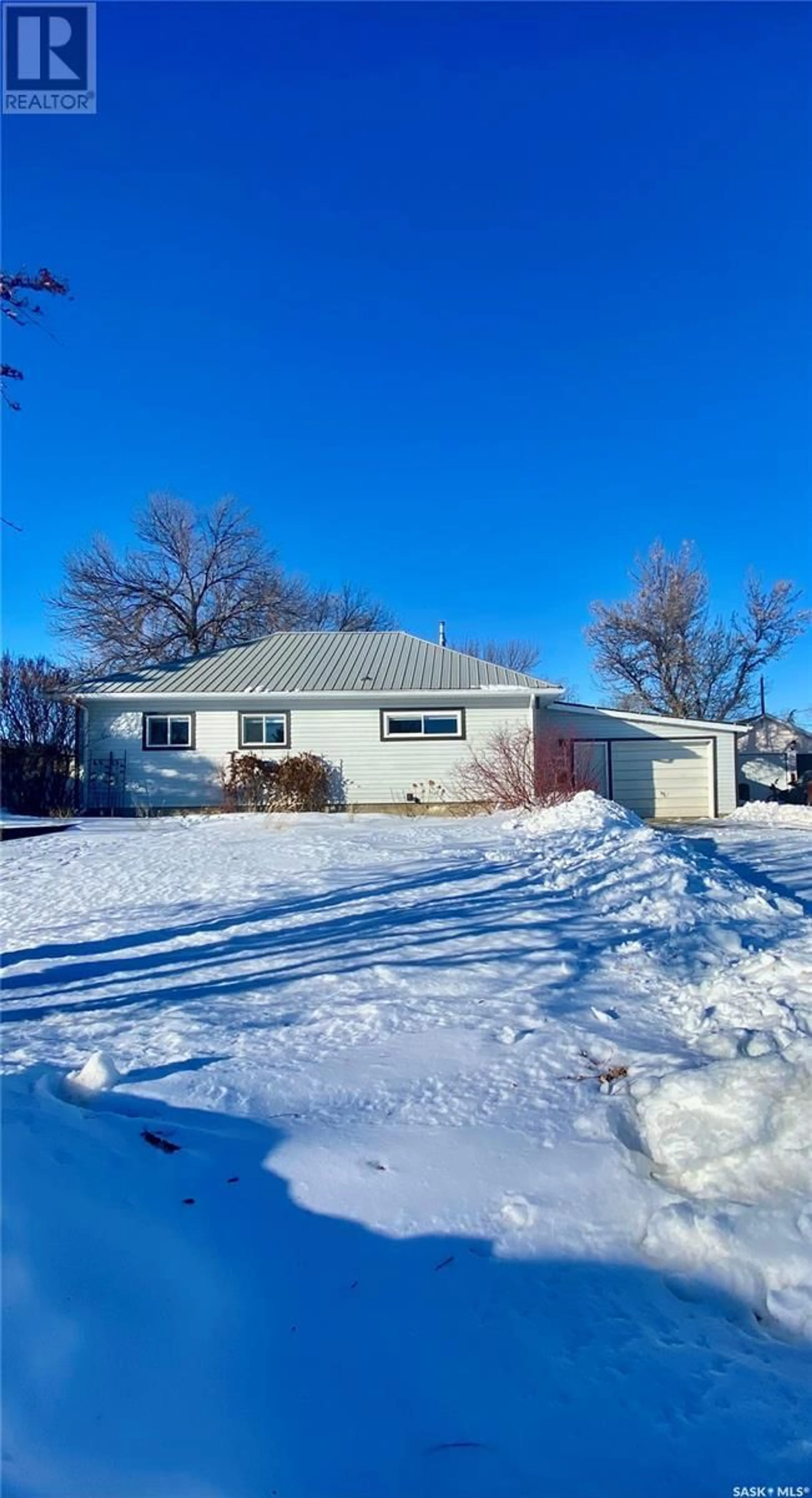 A pic from outside/outdoor area/front of a property/back of a property/a pic from drone, street for 102 Missouri Coteau STREET, Avonlea Saskatchewan S0H0C0