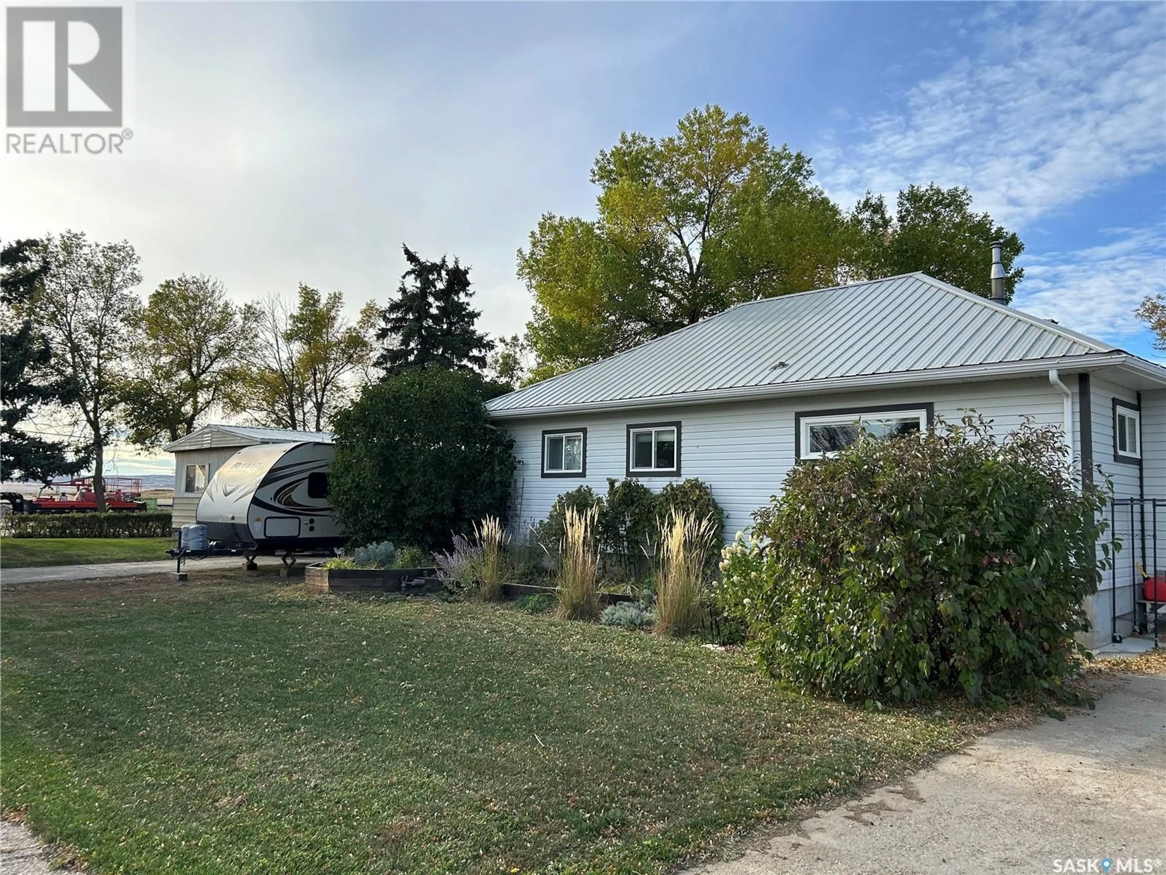 A pic from outside/outdoor area/front of a property/back of a property/a pic from drone, street for 102 Missouri Coteau STREET, Avonlea Saskatchewan S0H0C0