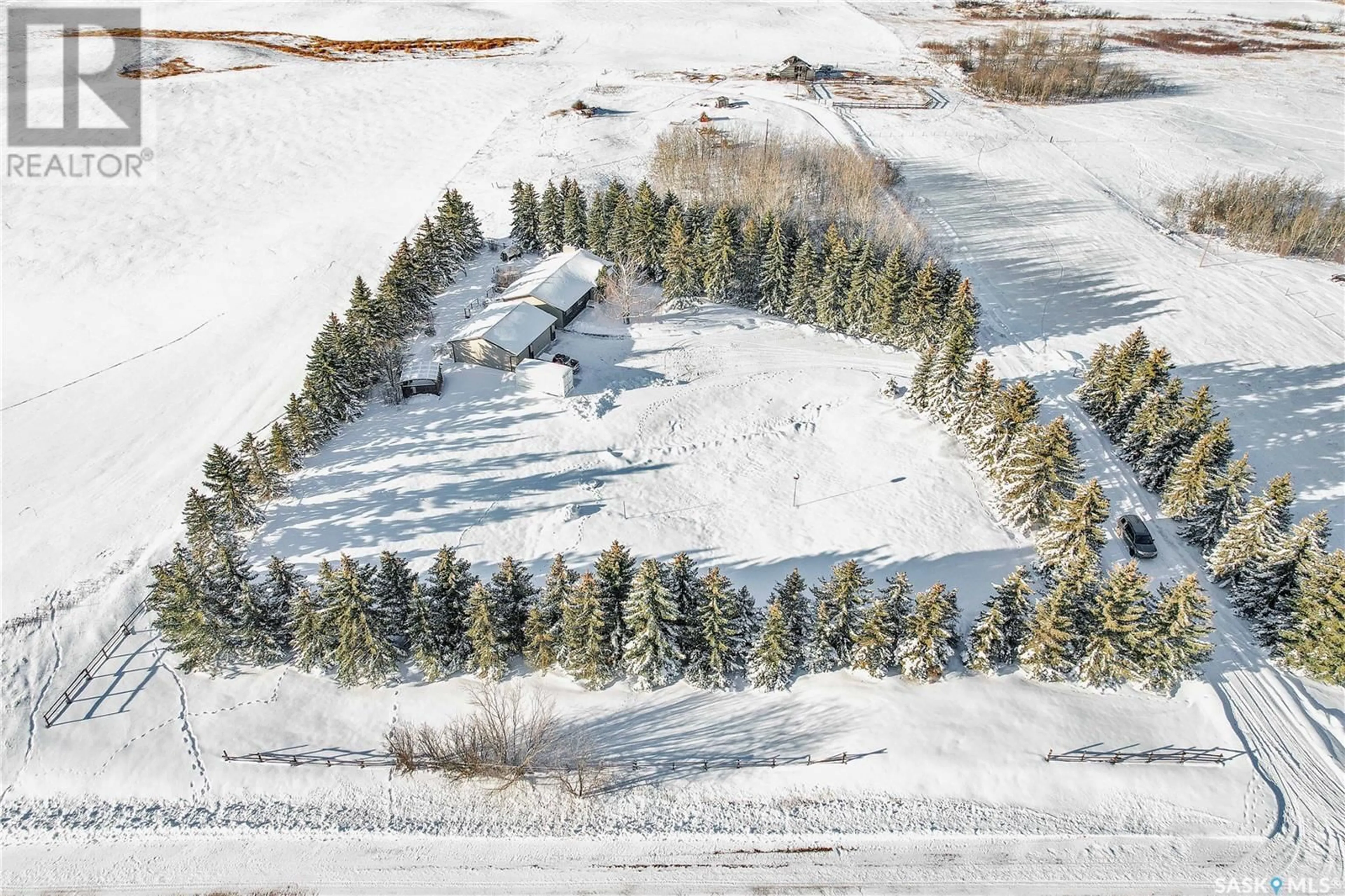 A pic from outside/outdoor area/front of a property/back of a property/a pic from drone, street for Saskatoon Spruce Acres, Corman Park Rm No. 344 Saskatchewan S7K1P3