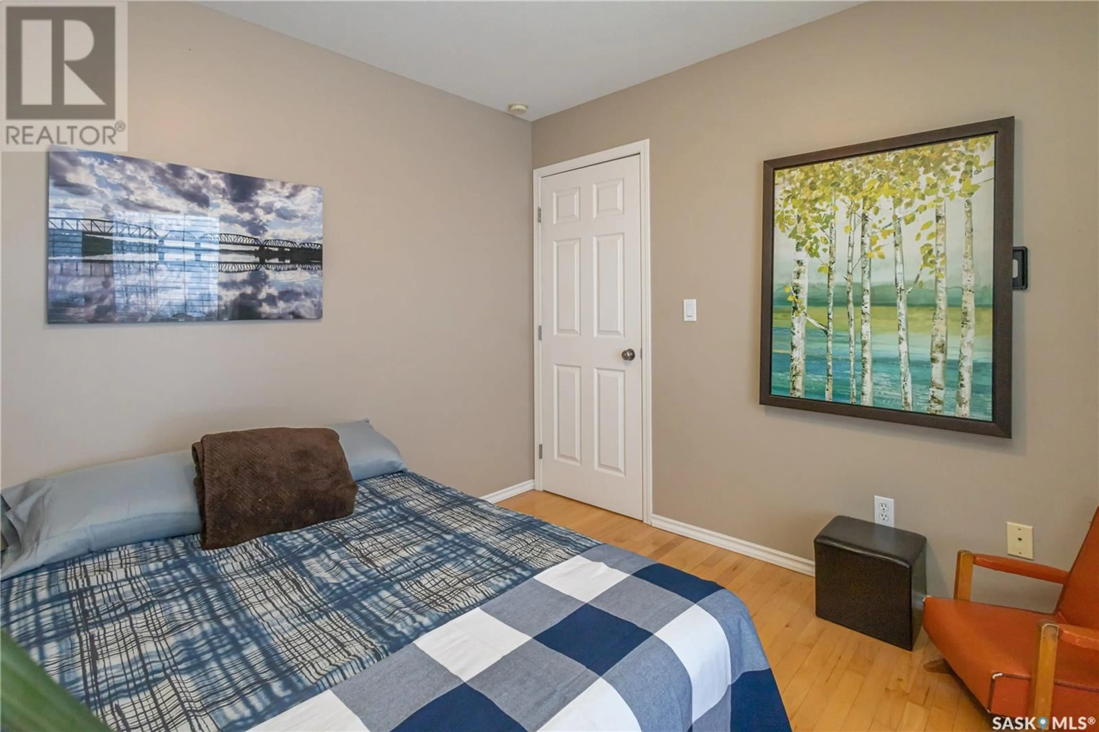 Bedroom with bed, wood/laminate floor for 160 South Point DRIVE, Corman Park Rm No. 344 Saskatchewan S7T1C6