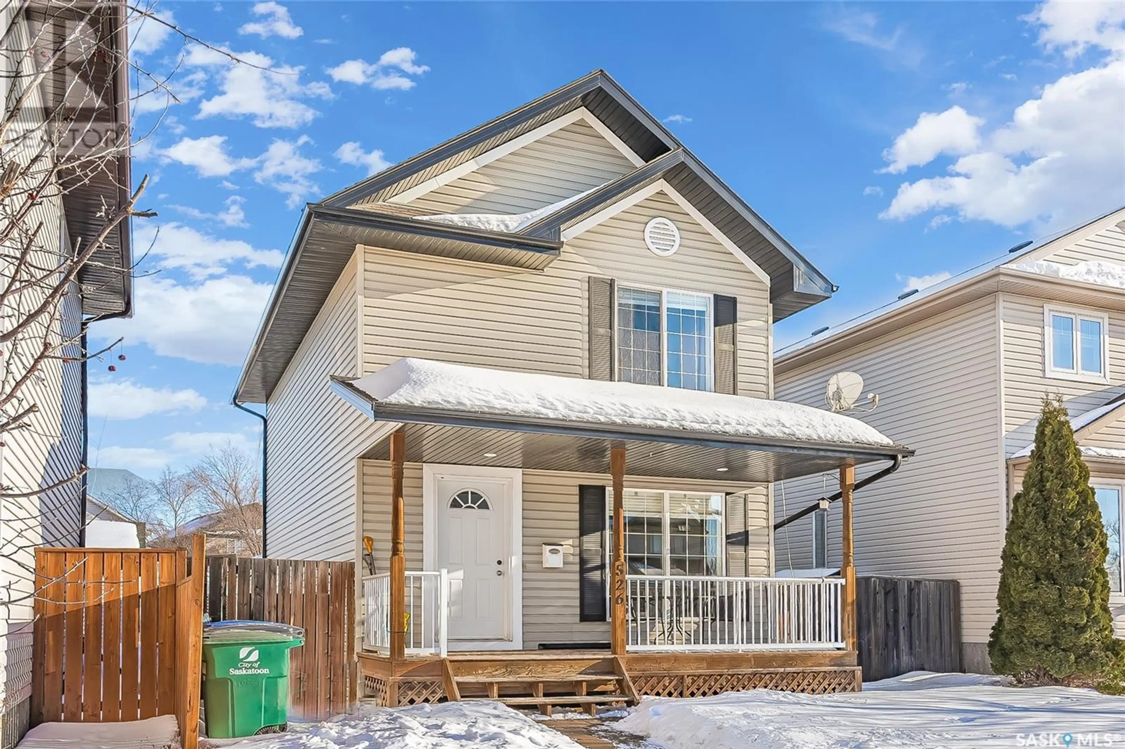 Home with vinyl exterior material, street for 526 Denham WAY, Saskatoon Saskatchewan S7R1E7