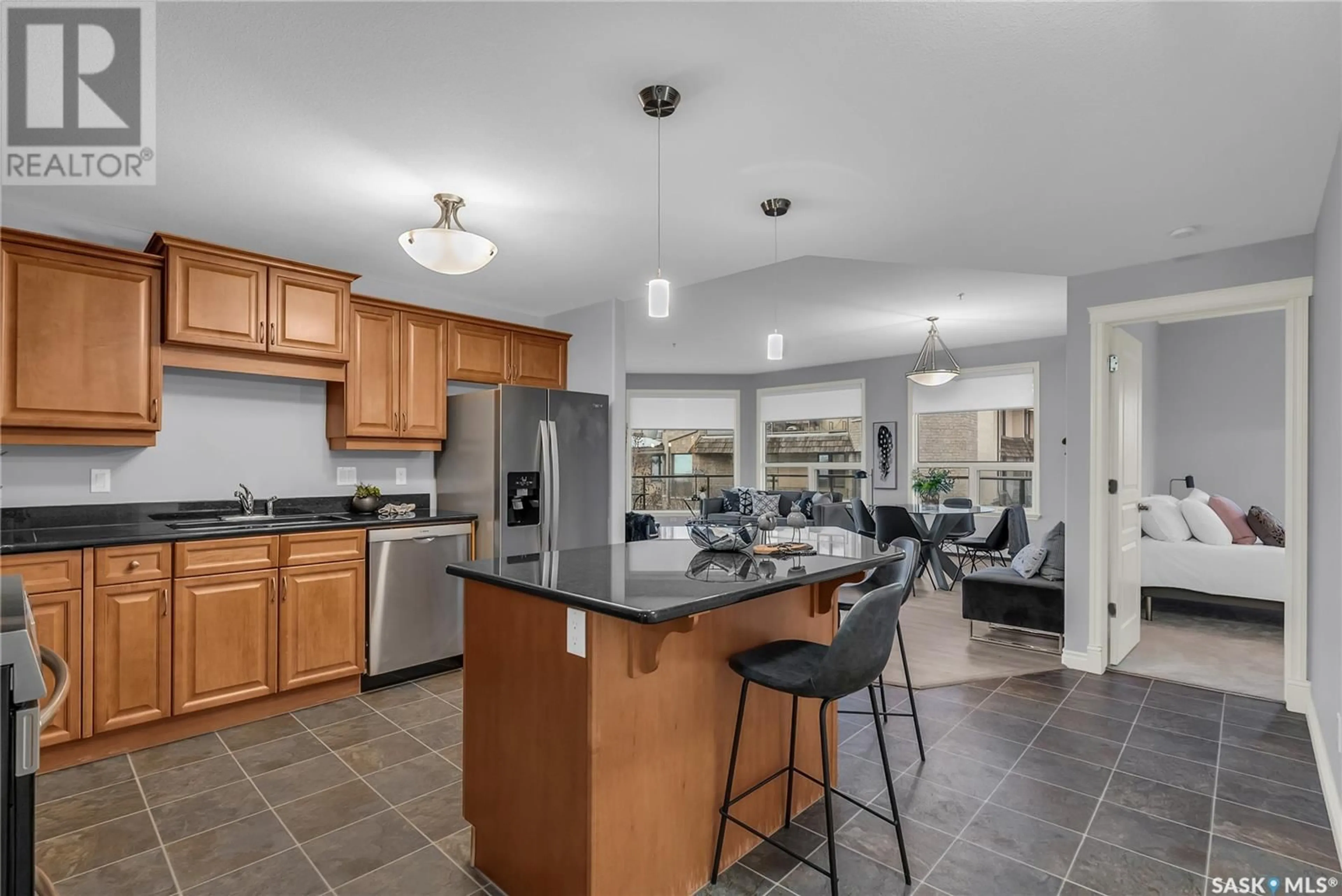 Open concept kitchen, ceramic/tile floor for 311 619 Saskatchewan CRESCENT W, Saskatoon Saskatchewan S7M0A5