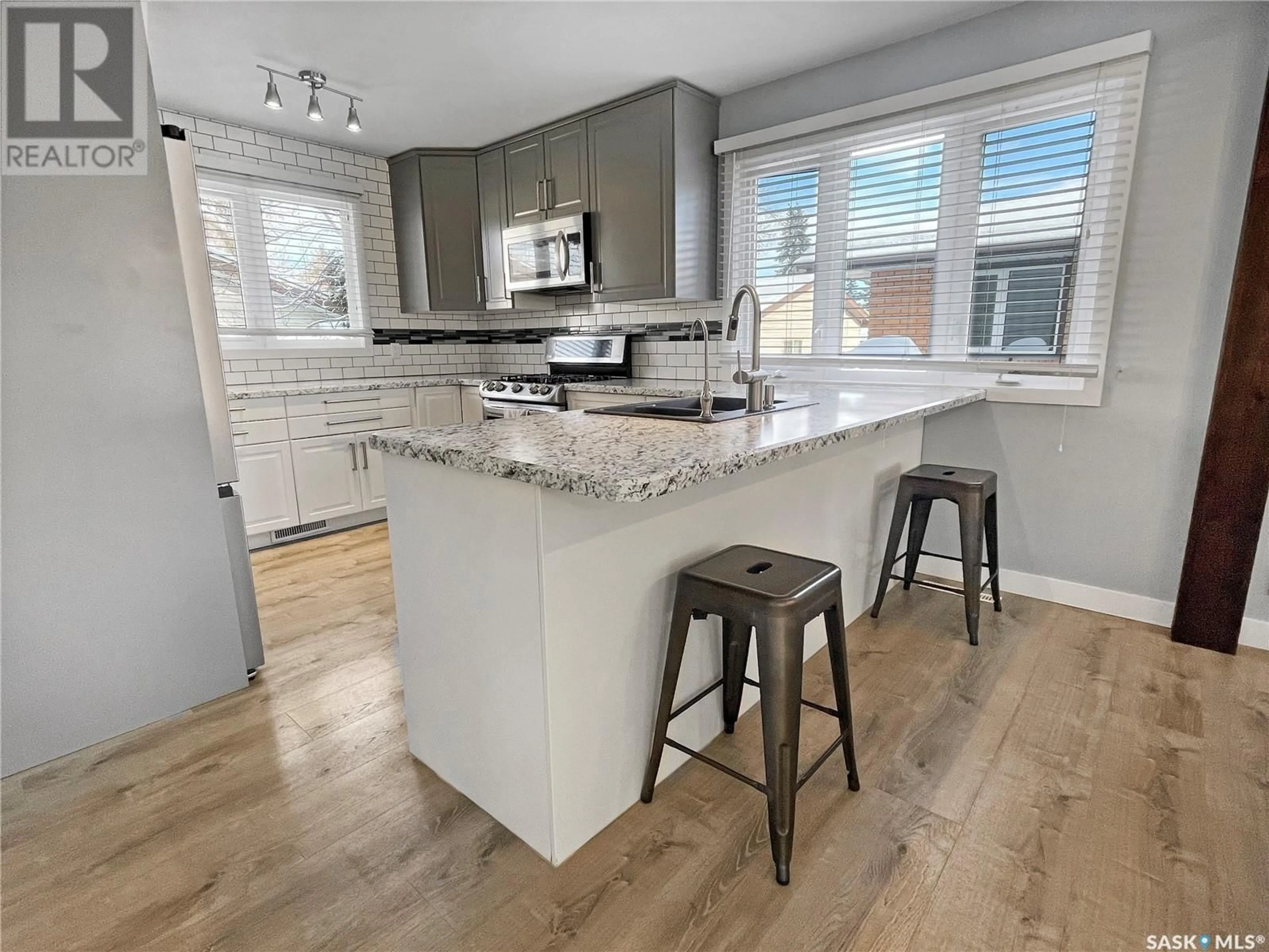 Open concept kitchen, unknown for 1123 George STREET E, Swift Current Saskatchewan S9H1Z5