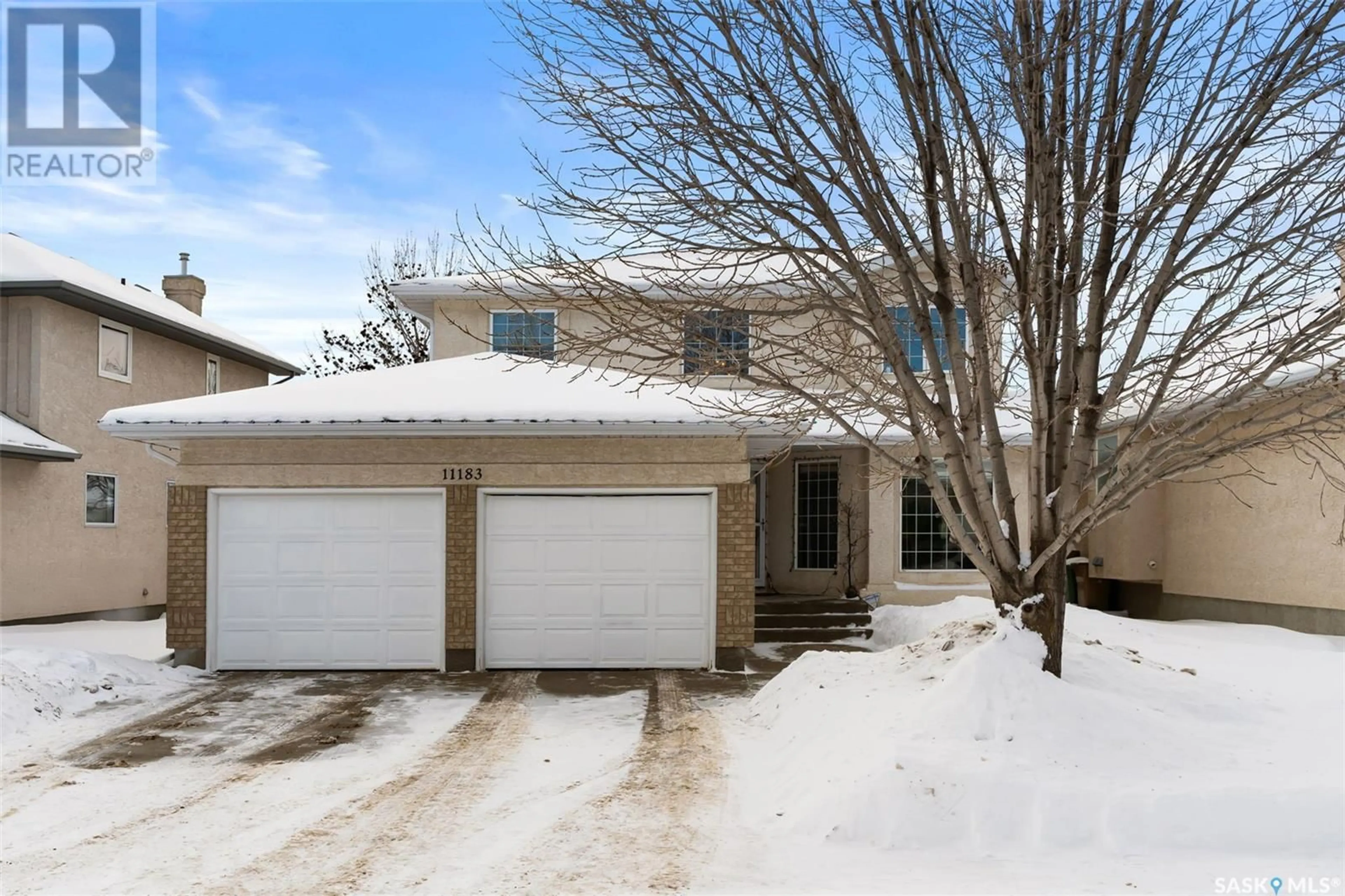 A pic from outside/outdoor area/front of a property/back of a property/a pic from drone, street for 11183 Wascana MEADOWS, Regina Saskatchewan S4V2W2