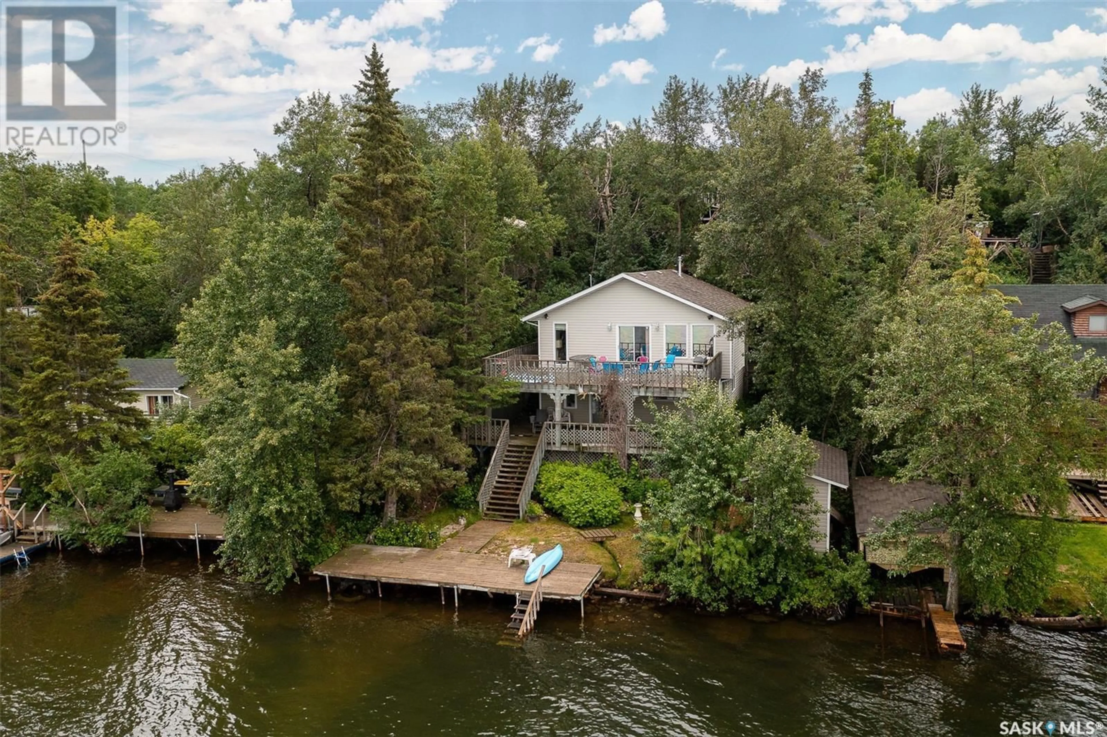 A pic from outside/outdoor area/front of a property/back of a property/a pic from drone, water/lake/river/ocean view for 809 Byng AVENUE, Wakaw Lake Saskatchewan S0K4P0