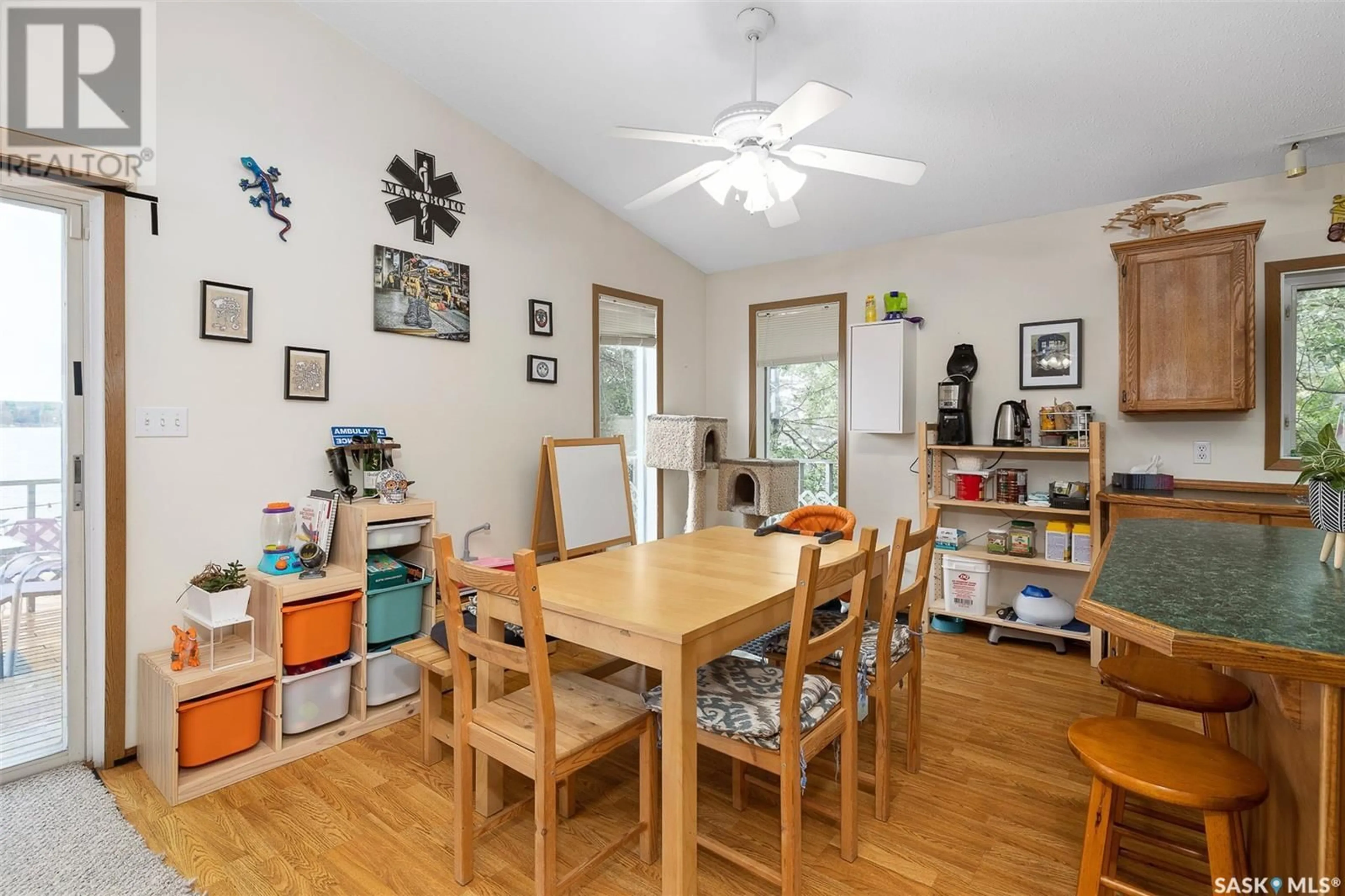 Dining room, wood/laminate floor for 809 Byng AVENUE, Wakaw Lake Saskatchewan S0K4P0