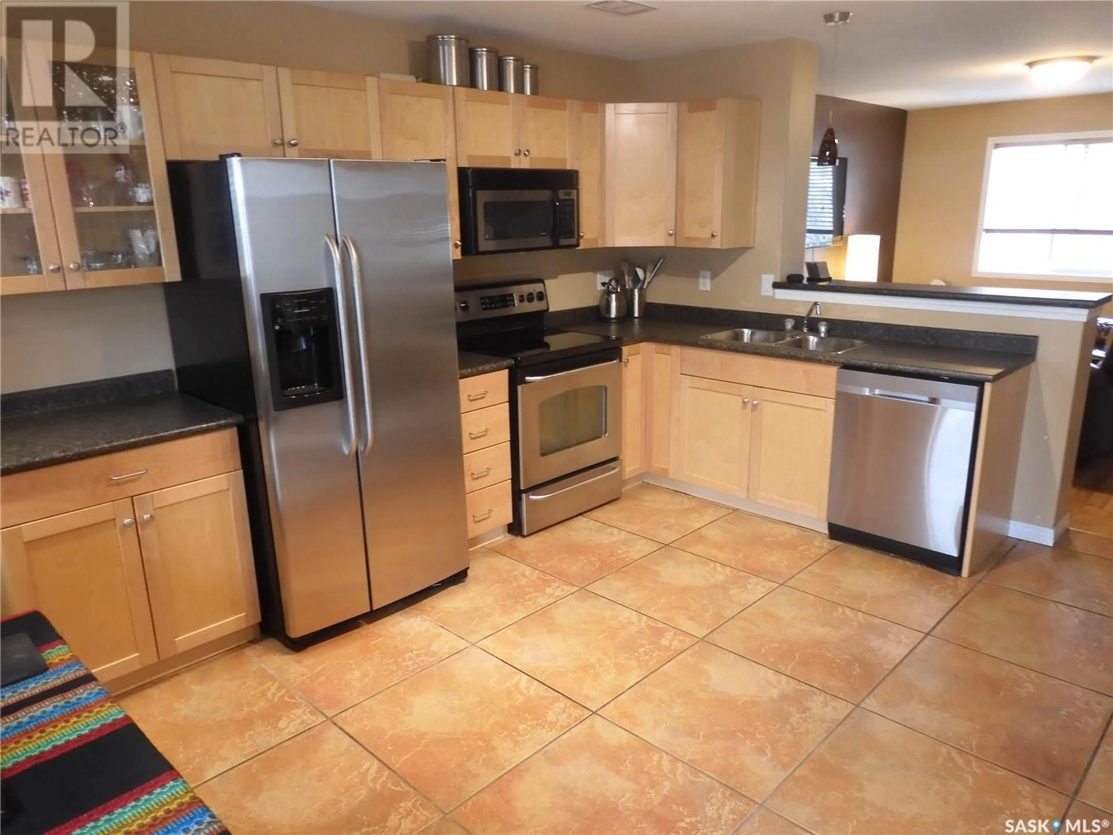 Standard kitchen, ceramic/tile floor for 11 1437 1st STREET, Estevan Saskatchewan S4A2X5