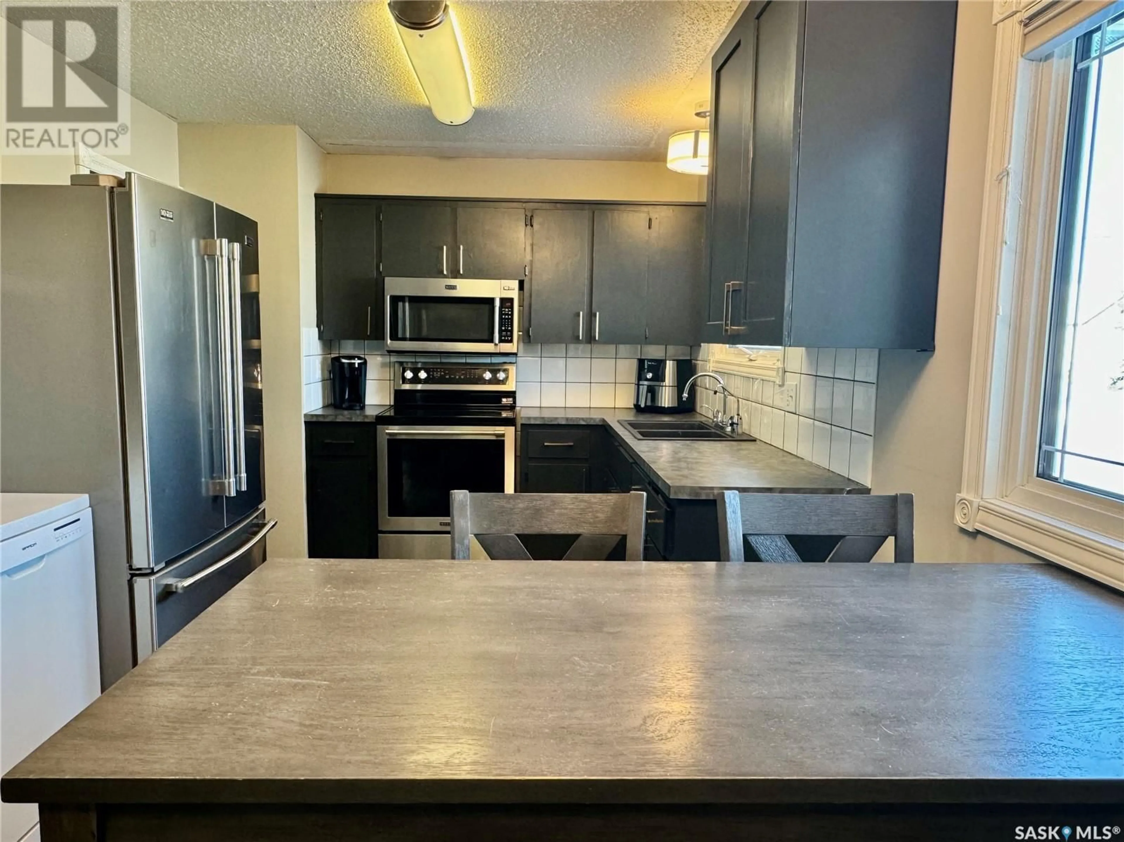 Open concept kitchen, unknown for 302 Glasgow AVENUE, Saltcoats Saskatchewan S0A3R0