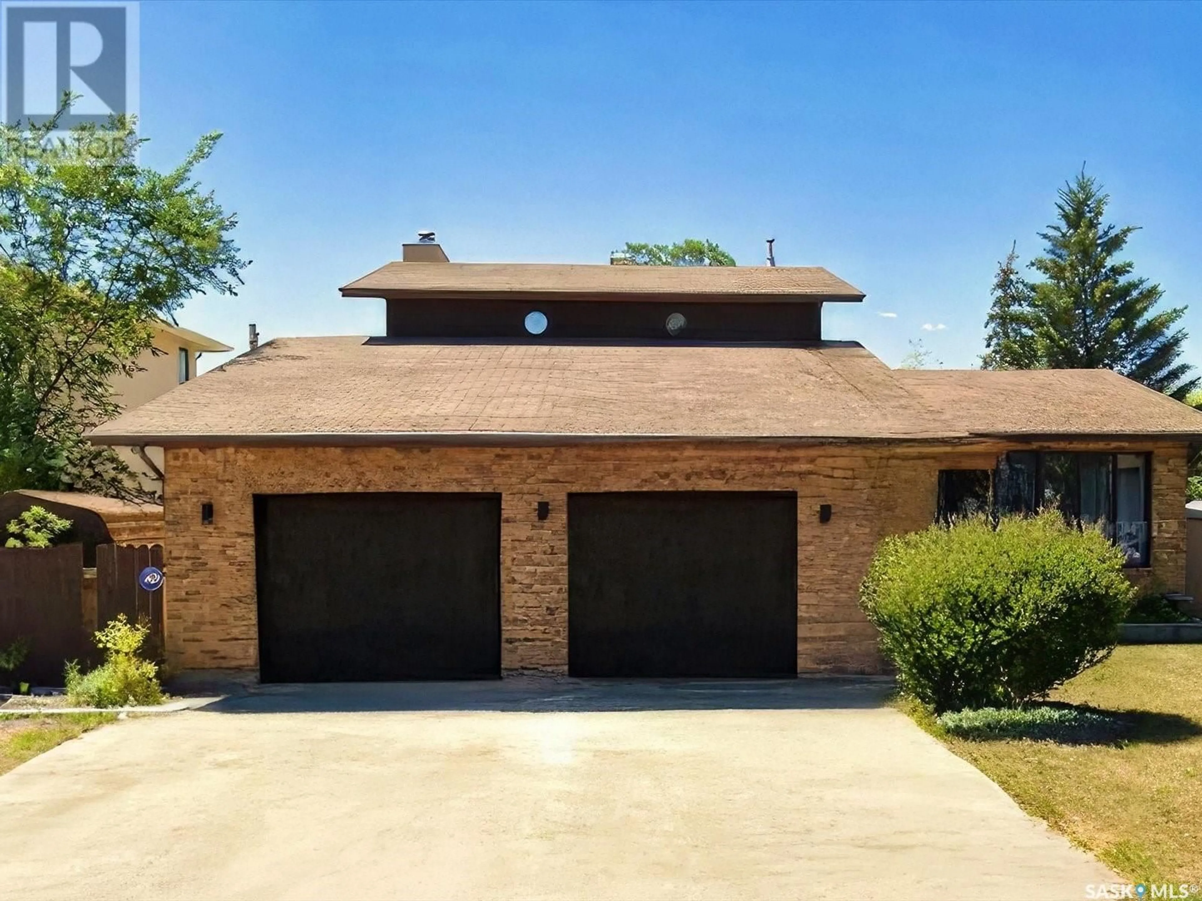 Home with brick exterior material, street for 510 HANSEN DRIVE, Regina Saskatchewan S4X3B8