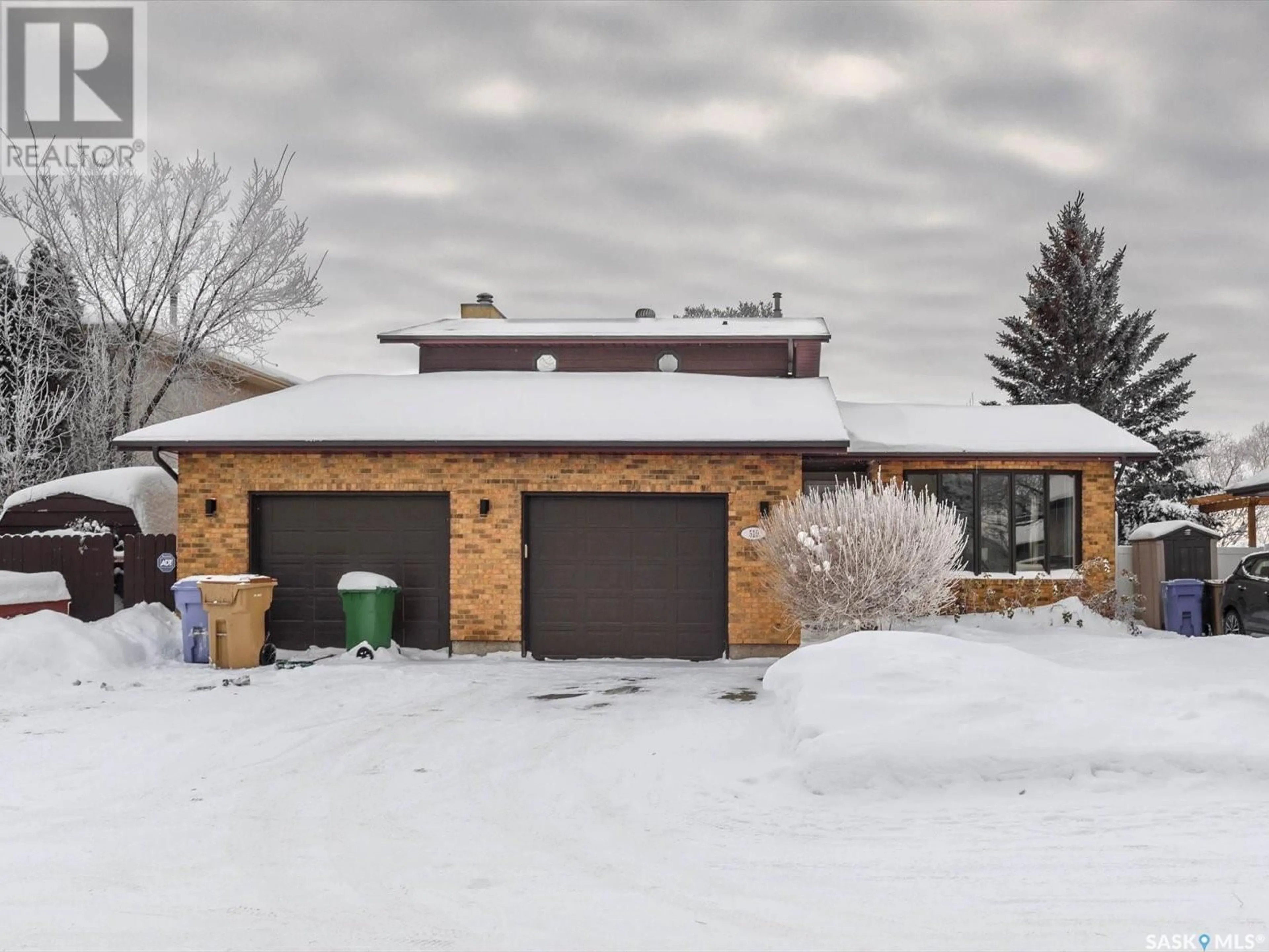 Home with brick exterior material, street for 510 HANSEN DRIVE, Regina Saskatchewan S4X3B8