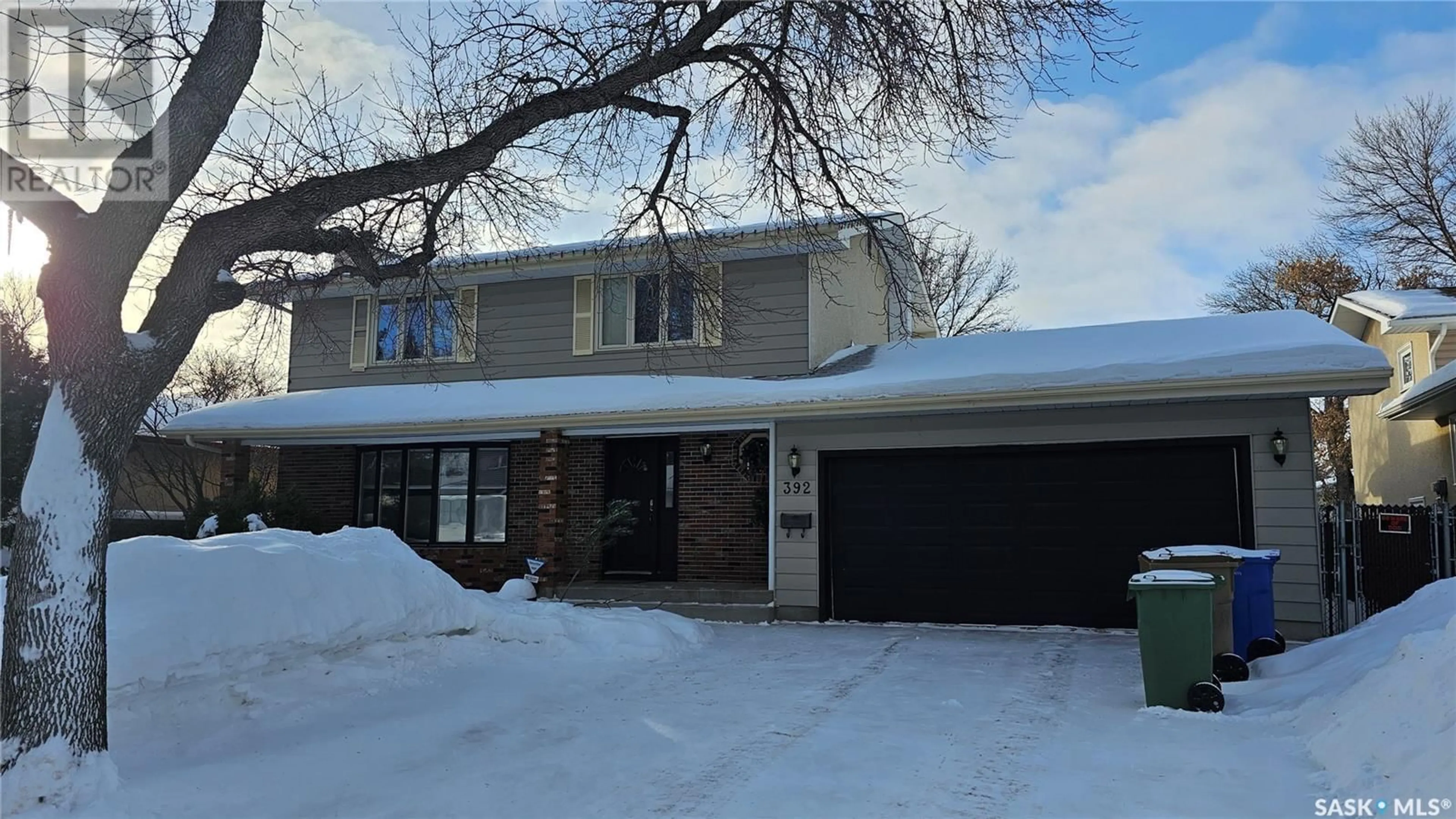 Home with vinyl exterior material, street for 392 HABKIRK DRIVE, Regina Saskatchewan S4S6B1