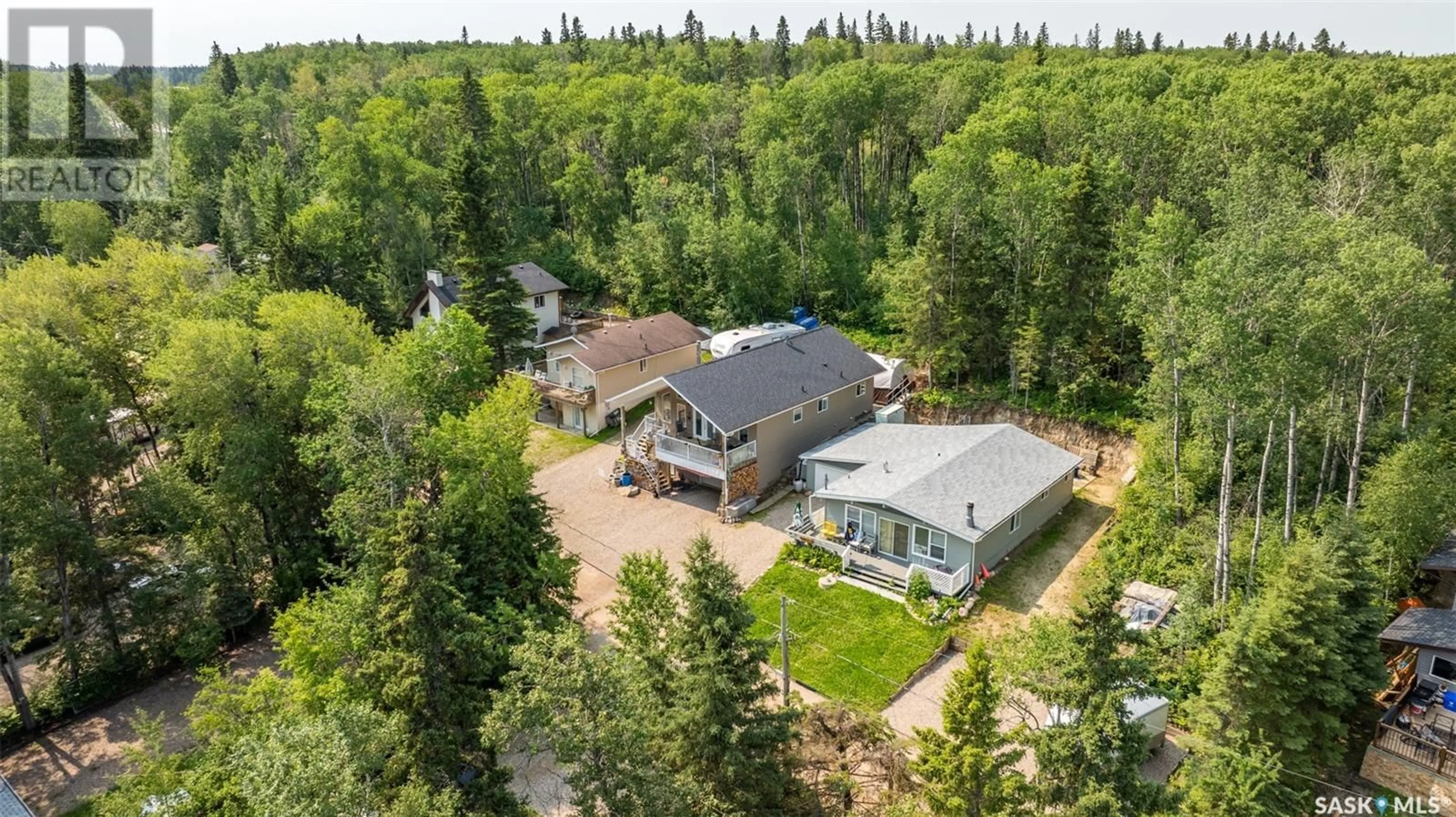 A pic from outside/outdoor area/front of a property/back of a property/a pic from drone, unknown for 320 Agnes STREET, Emma Lake Saskatchewan S0J0N0