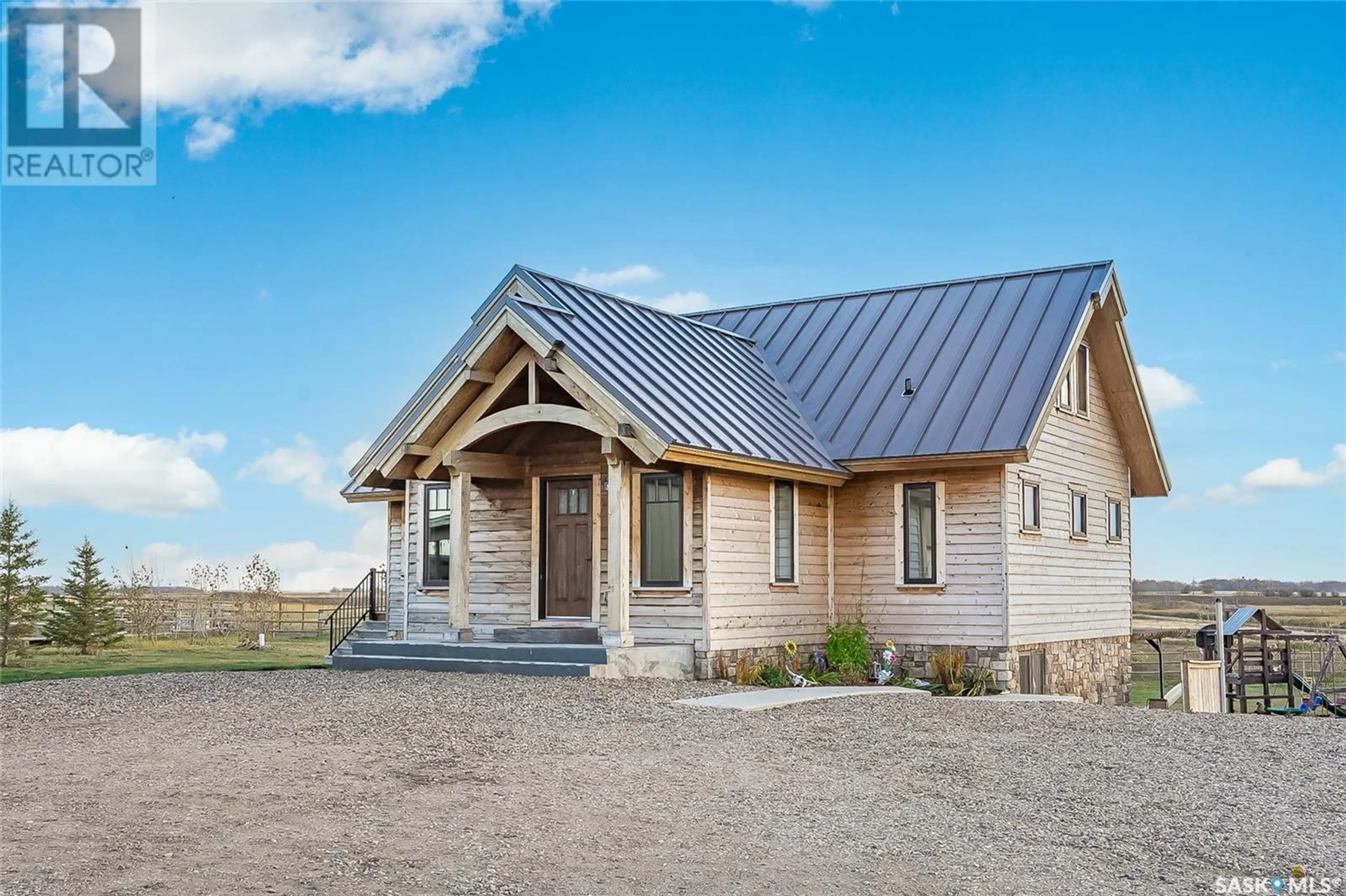 Home with vinyl exterior material, building for Cooke Acreage - Auction Mart Rd, Corman Park Rm No. 344 Saskatchewan S7K3J5