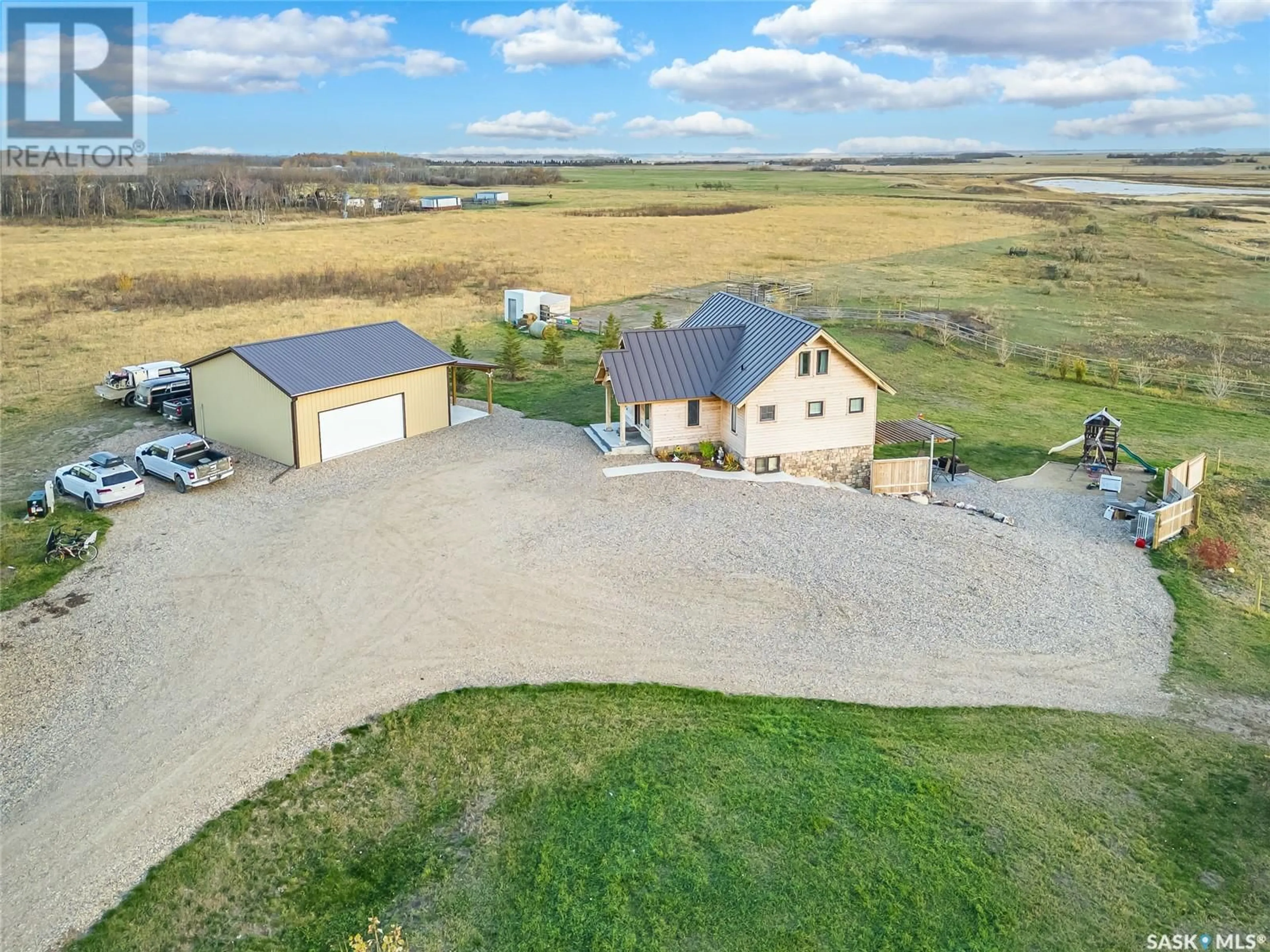 A pic from outside/outdoor area/front of a property/back of a property/a pic from drone, unknown for Cooke Acreage - Auction Mart Rd, Corman Park Rm No. 344 Saskatchewan S7K3J5