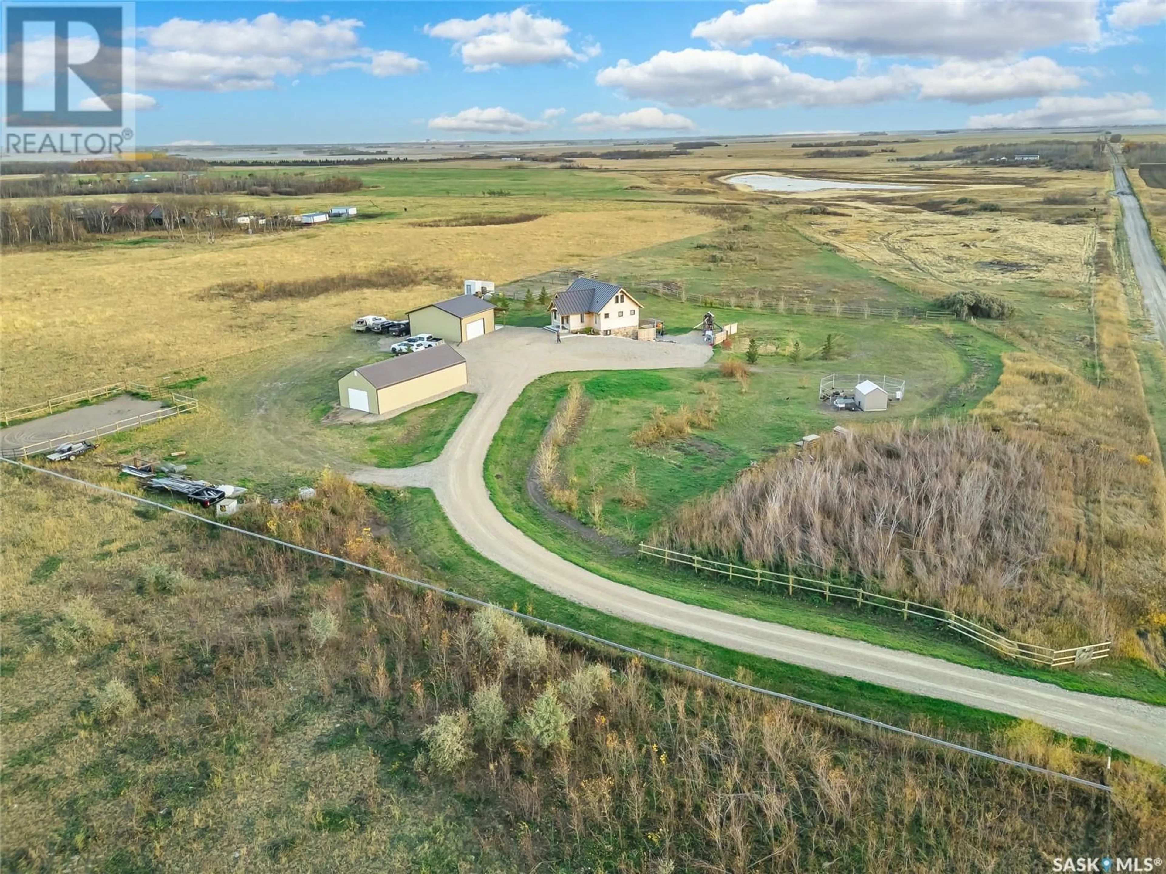 A pic from outside/outdoor area/front of a property/back of a property/a pic from drone, unknown for Cooke Acreage - Auction Mart Rd, Corman Park Rm No. 344 Saskatchewan S7K3J5