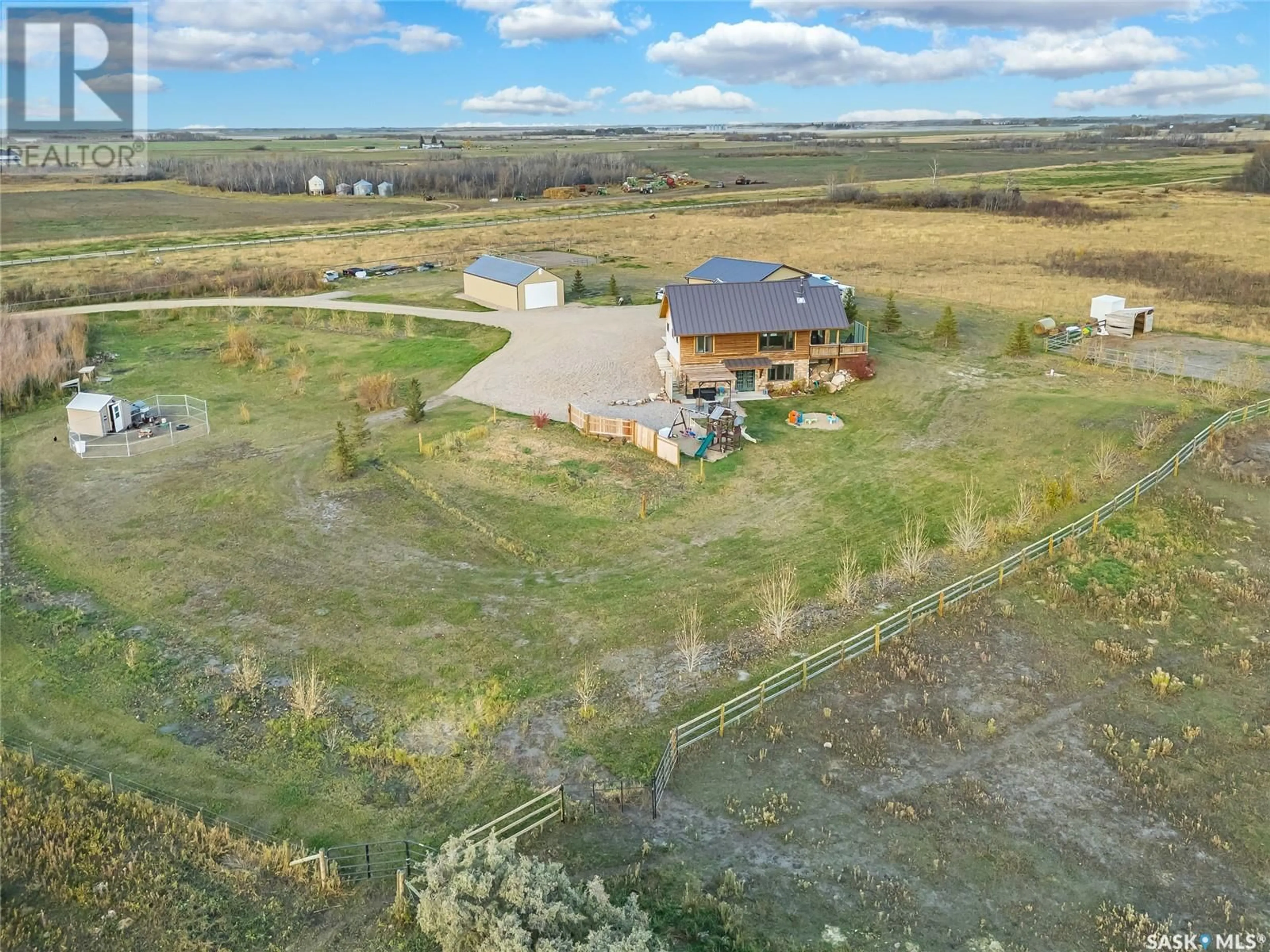 A pic from outside/outdoor area/front of a property/back of a property/a pic from drone, unknown for Cooke Acreage - Auction Mart Rd, Corman Park Rm No. 344 Saskatchewan S7K3J5