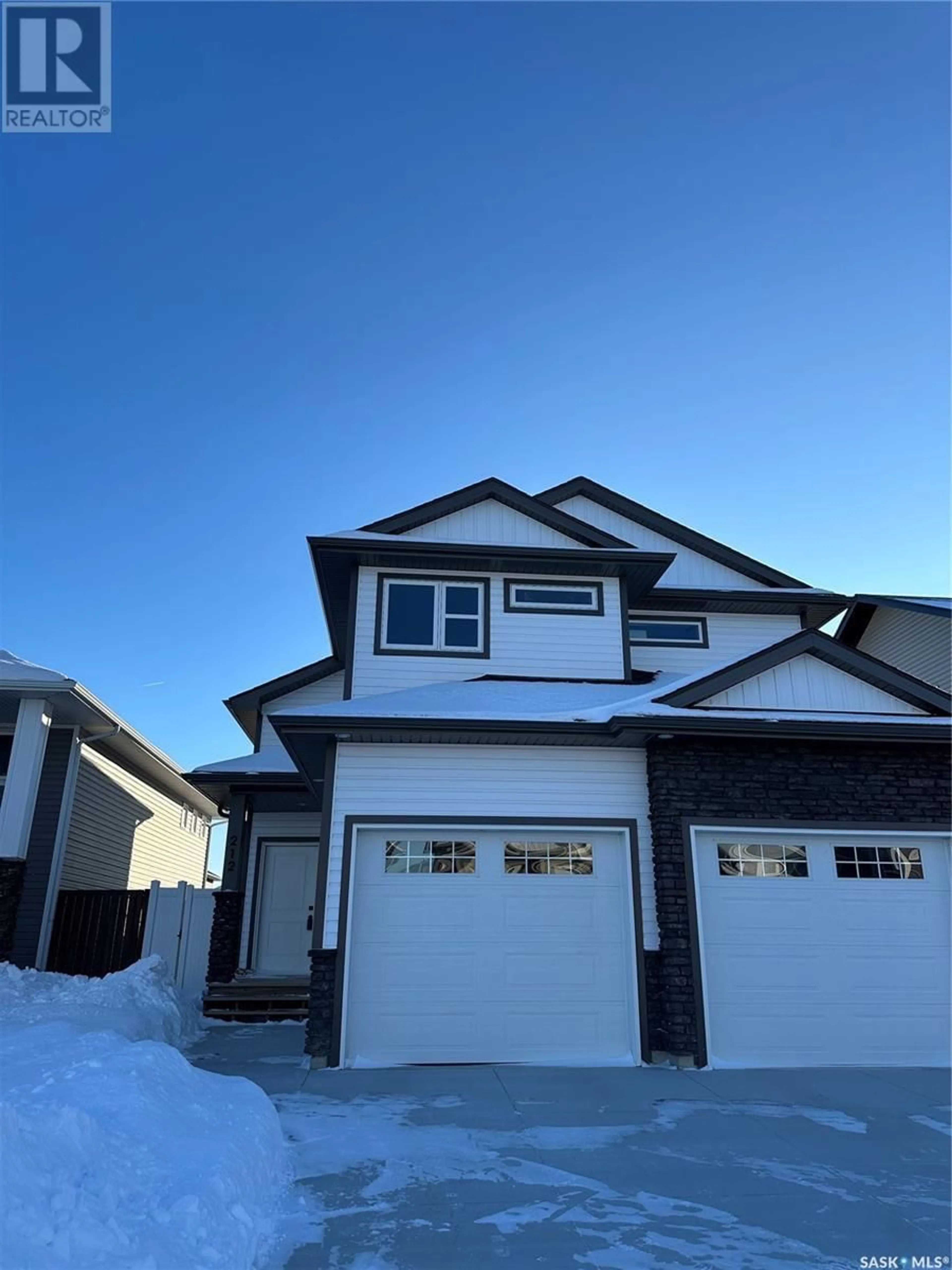 Home with vinyl exterior material, street for 212 Cowan CRESCENT, Martensville Saskatchewan S0K2T1