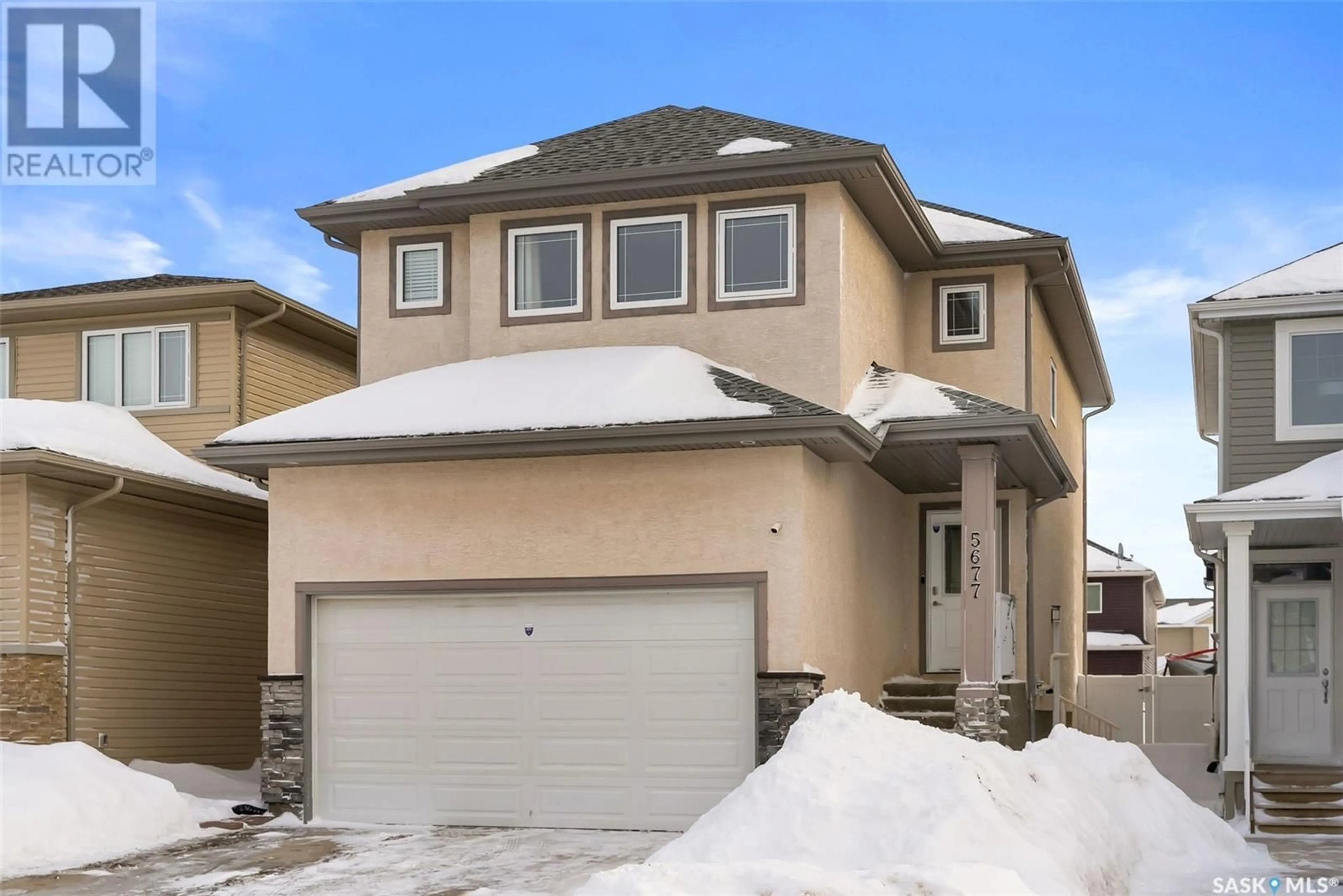 Home with vinyl exterior material, street for 5677 Pearsall CRESCENT, Regina Saskatchewan S4W0K1