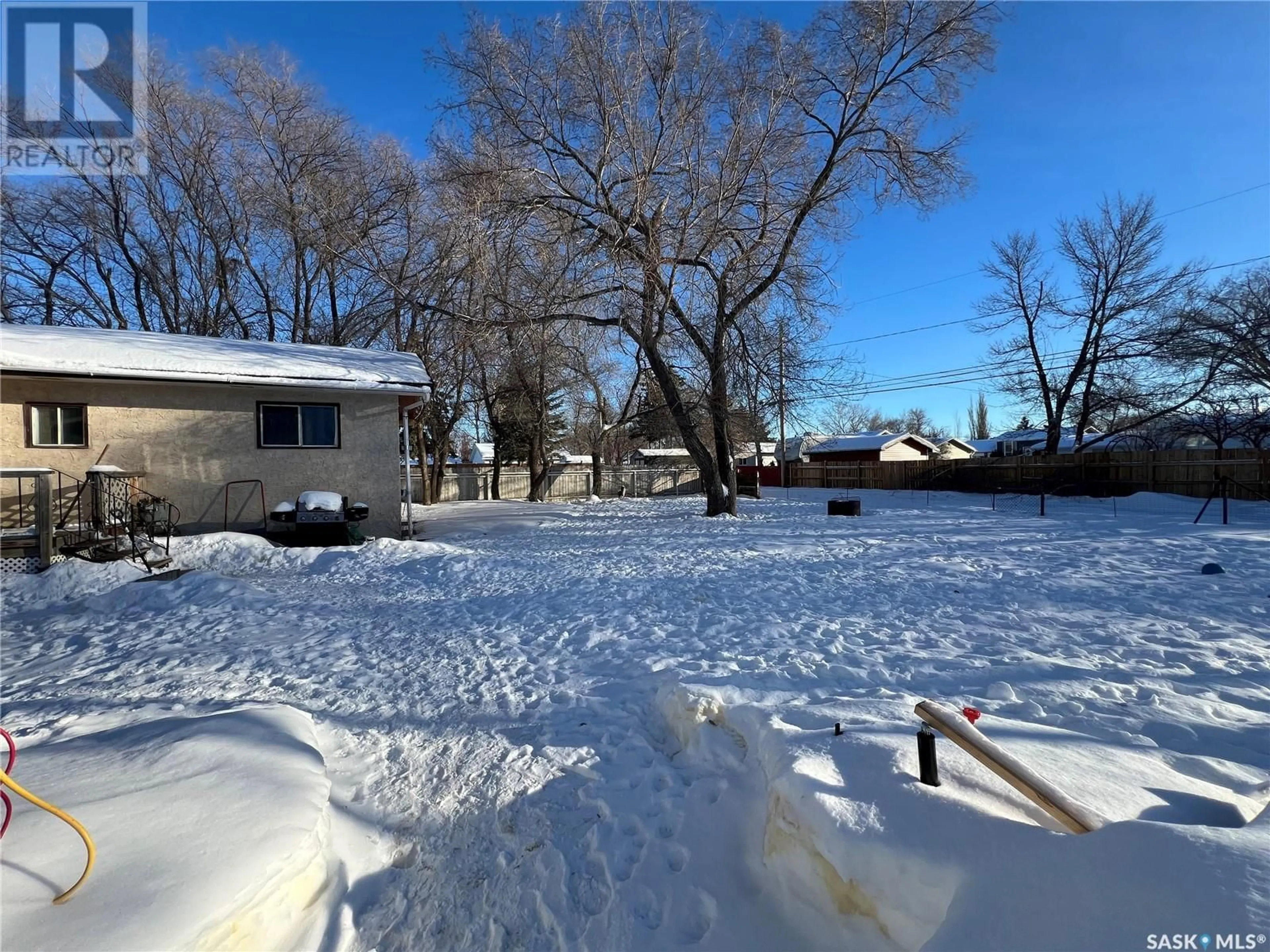 A pic from outside/outdoor area/front of a property/back of a property/a pic from drone, street for 330 2nd STREET S, Martensville Saskatchewan S0K0A2