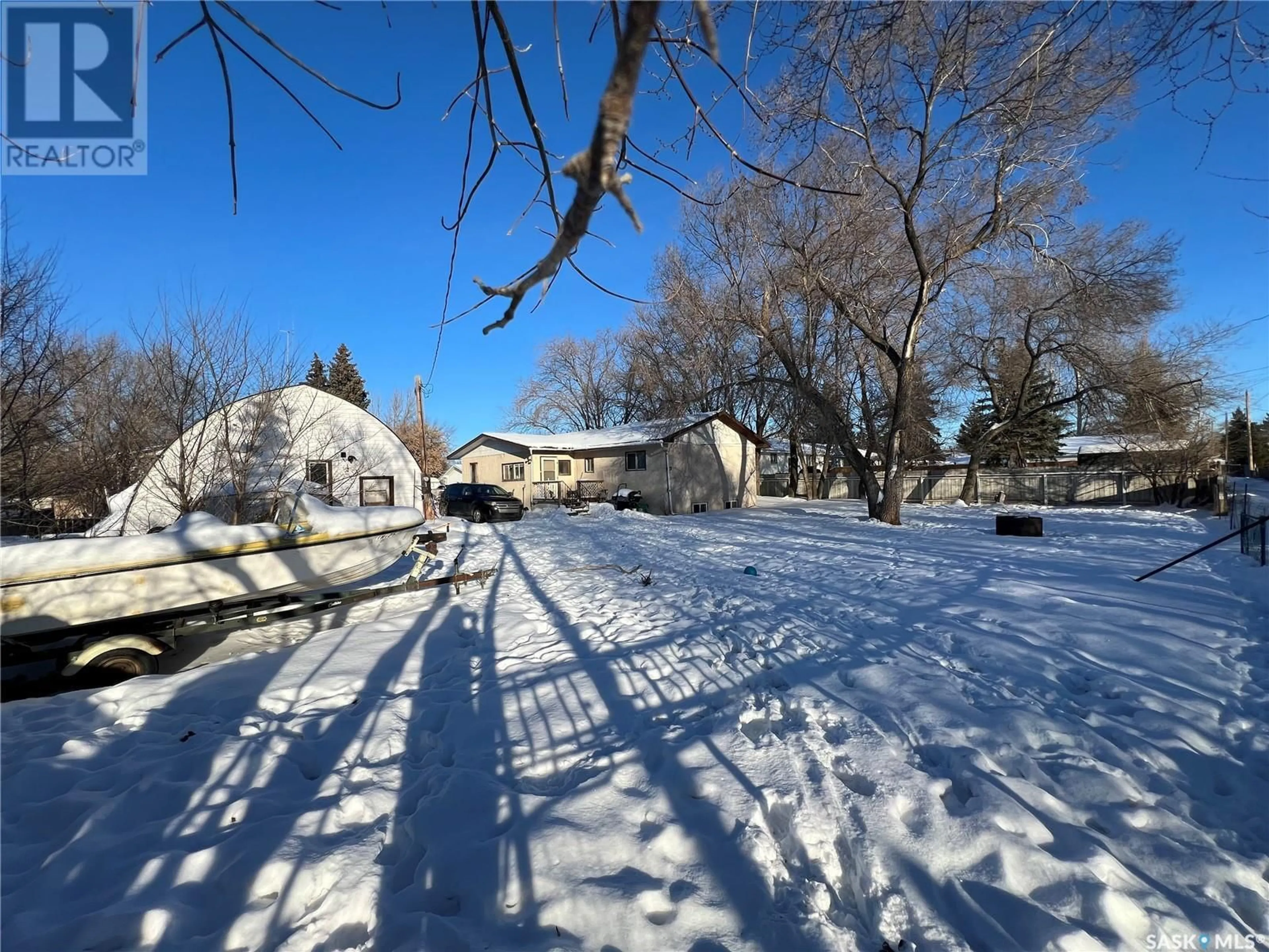 A pic from outside/outdoor area/front of a property/back of a property/a pic from drone, street for 330 2nd STREET S, Martensville Saskatchewan S0K0A2