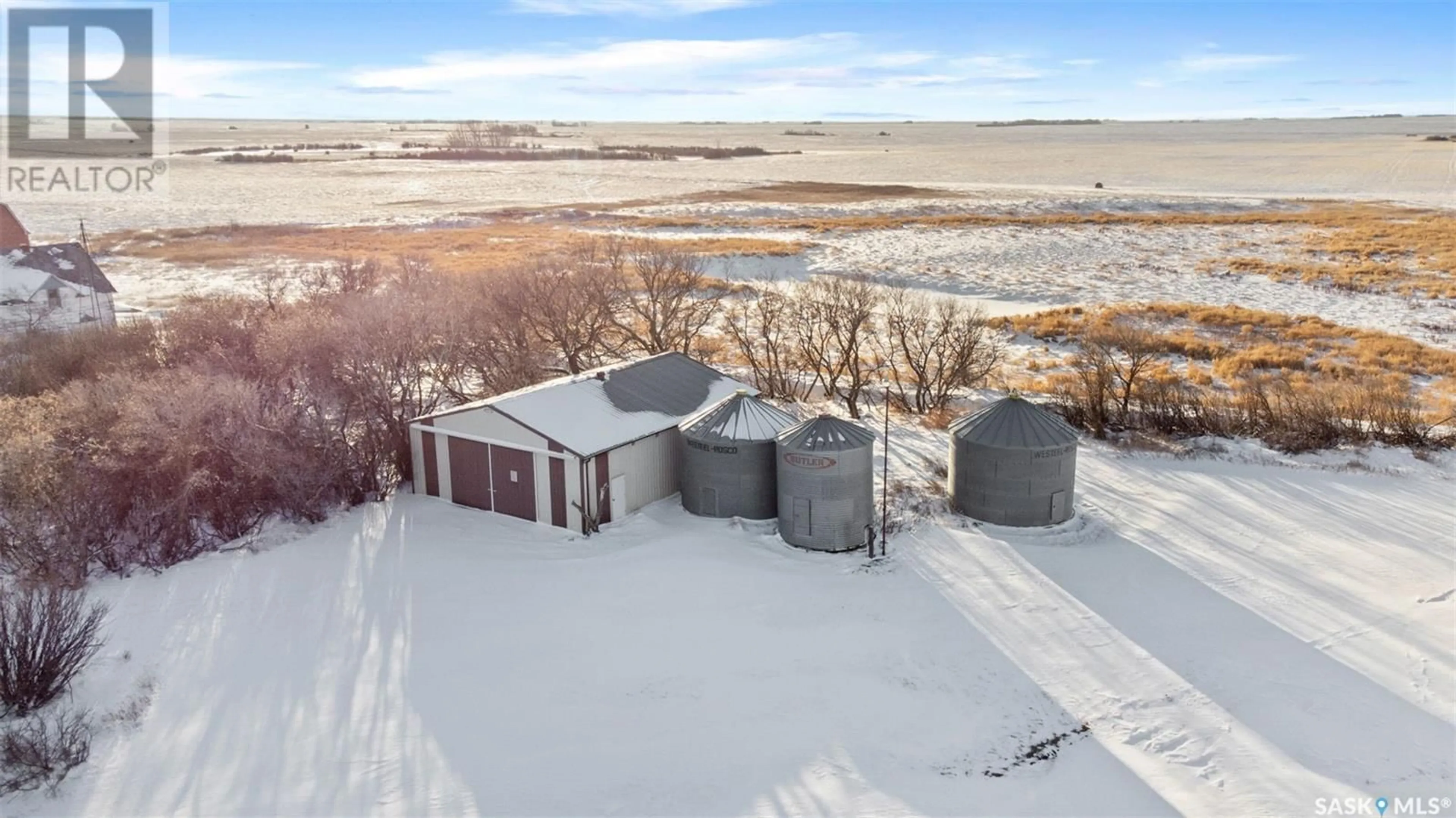 A pic from outside/outdoor area/front of a property/back of a property/a pic from drone, water/lake/river/ocean view for BENDER ACREAGE, Loreburn Rm No. 254 Saskatchewan S0H2S0