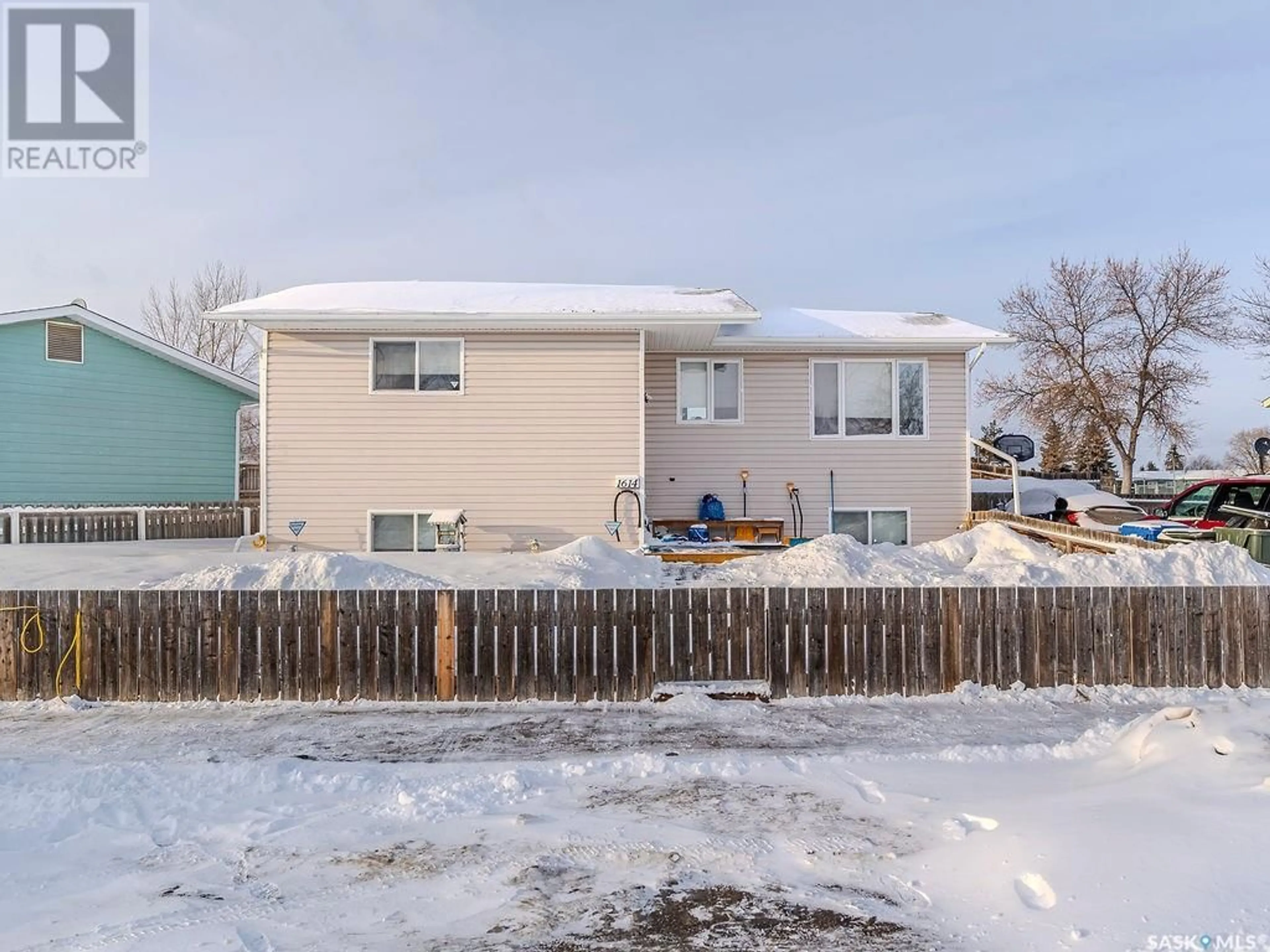 A pic from outside/outdoor area/front of a property/back of a property/a pic from drone, street for 1614 Muir DRIVE, Prince Albert Saskatchewan S6V6V7