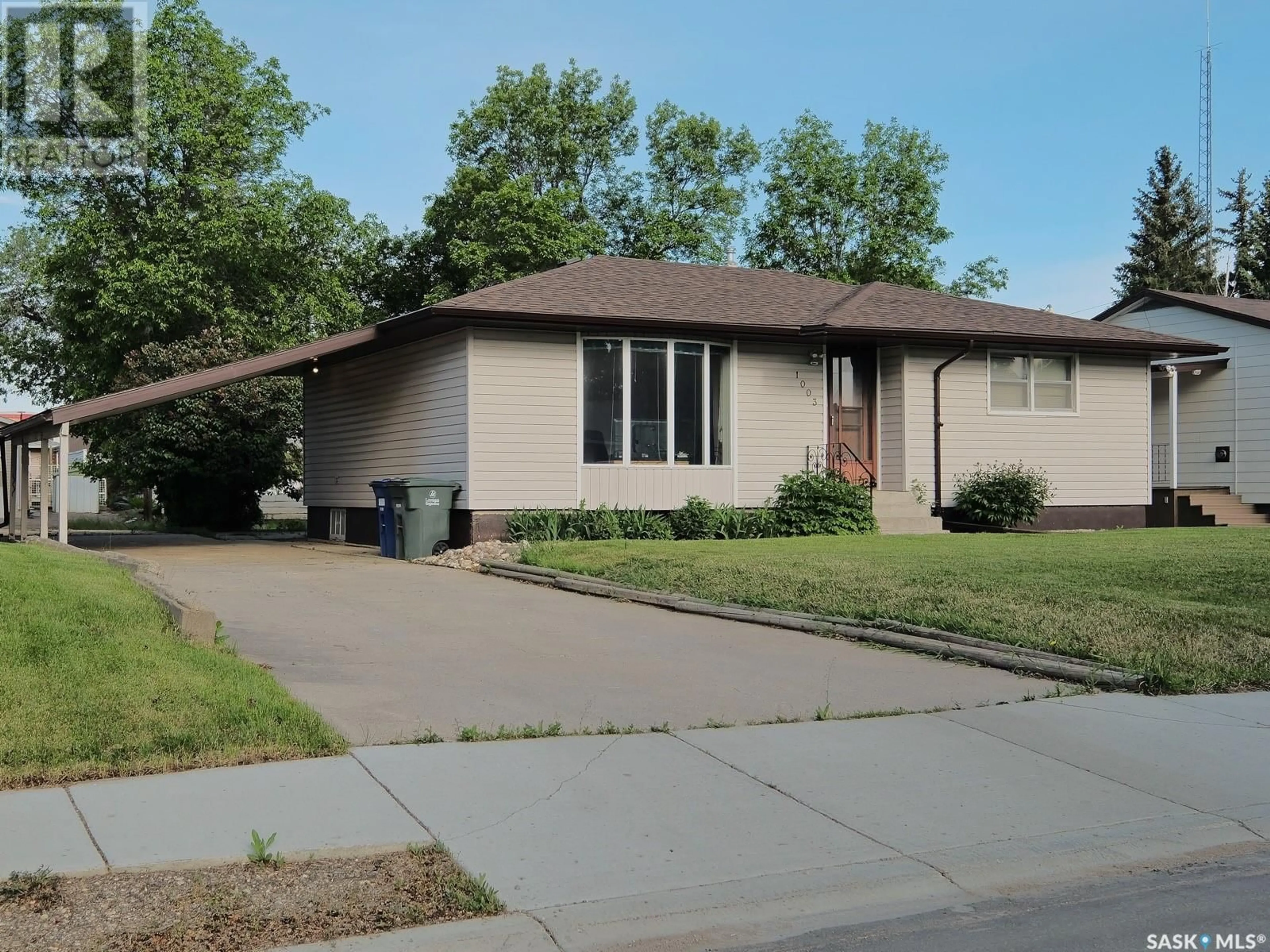 Home with vinyl exterior material, street for 1003 King STREET, Rosetown Saskatchewan S0L2V0