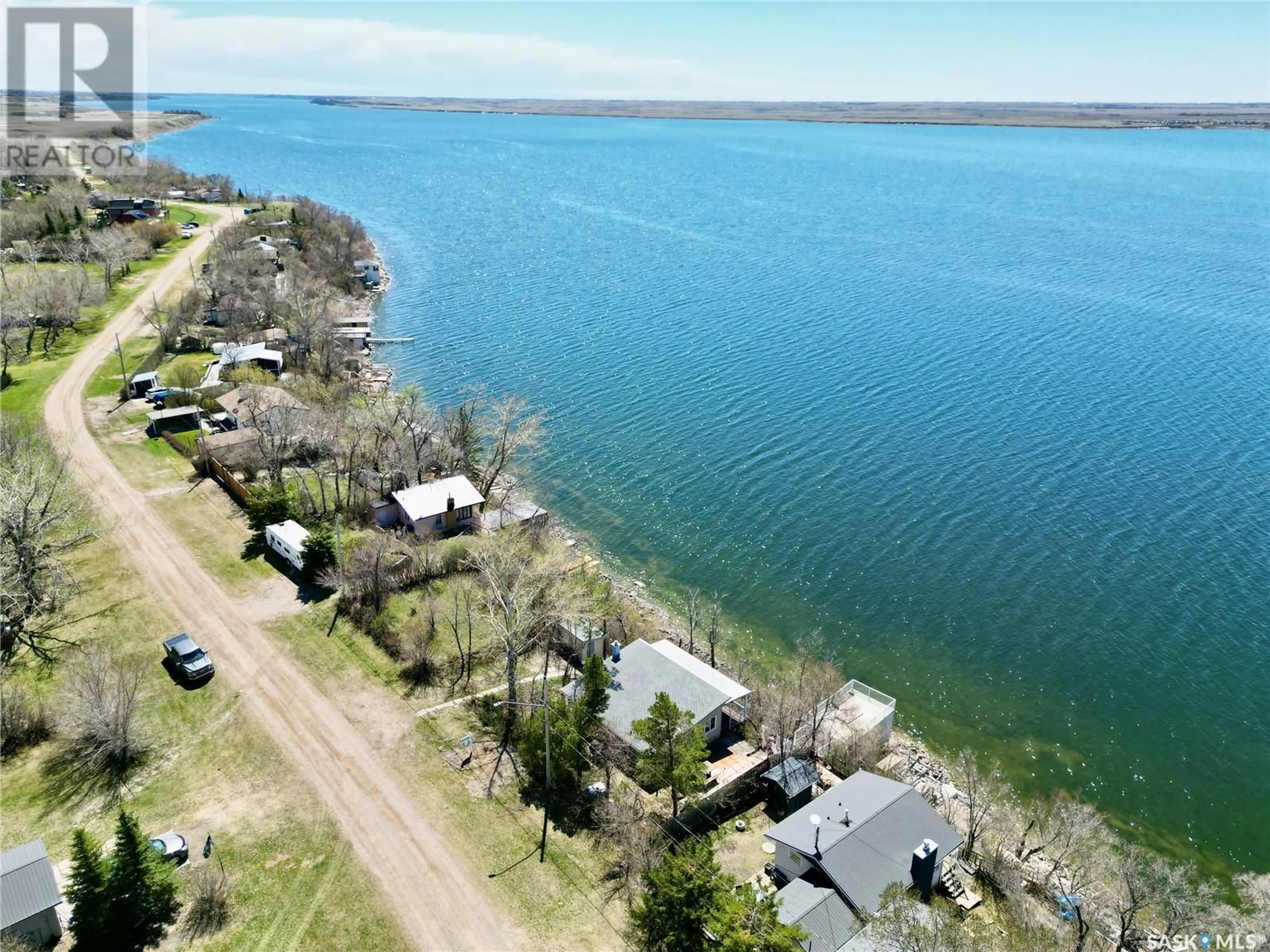 A pic from outside/outdoor area/front of a property/back of a property/a pic from drone, water/lake/river/ocean view for 424 LAST MOUNTAIN ROAD, Spring Bay Saskatchewan S0G4L0
