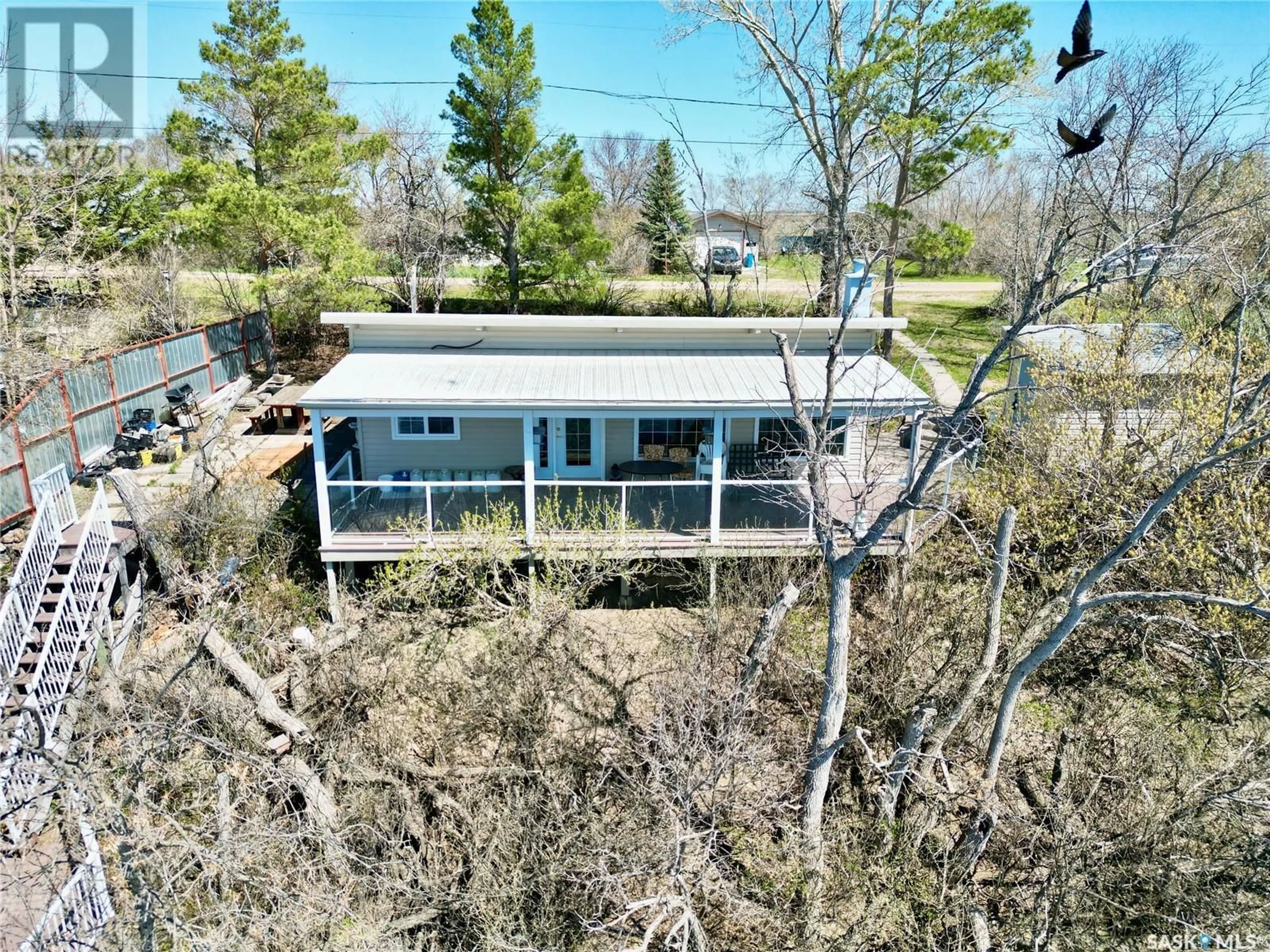 A pic from outside/outdoor area/front of a property/back of a property/a pic from drone, unknown for 424 LAST MOUNTAIN ROAD, Spring Bay Saskatchewan S0G4L0