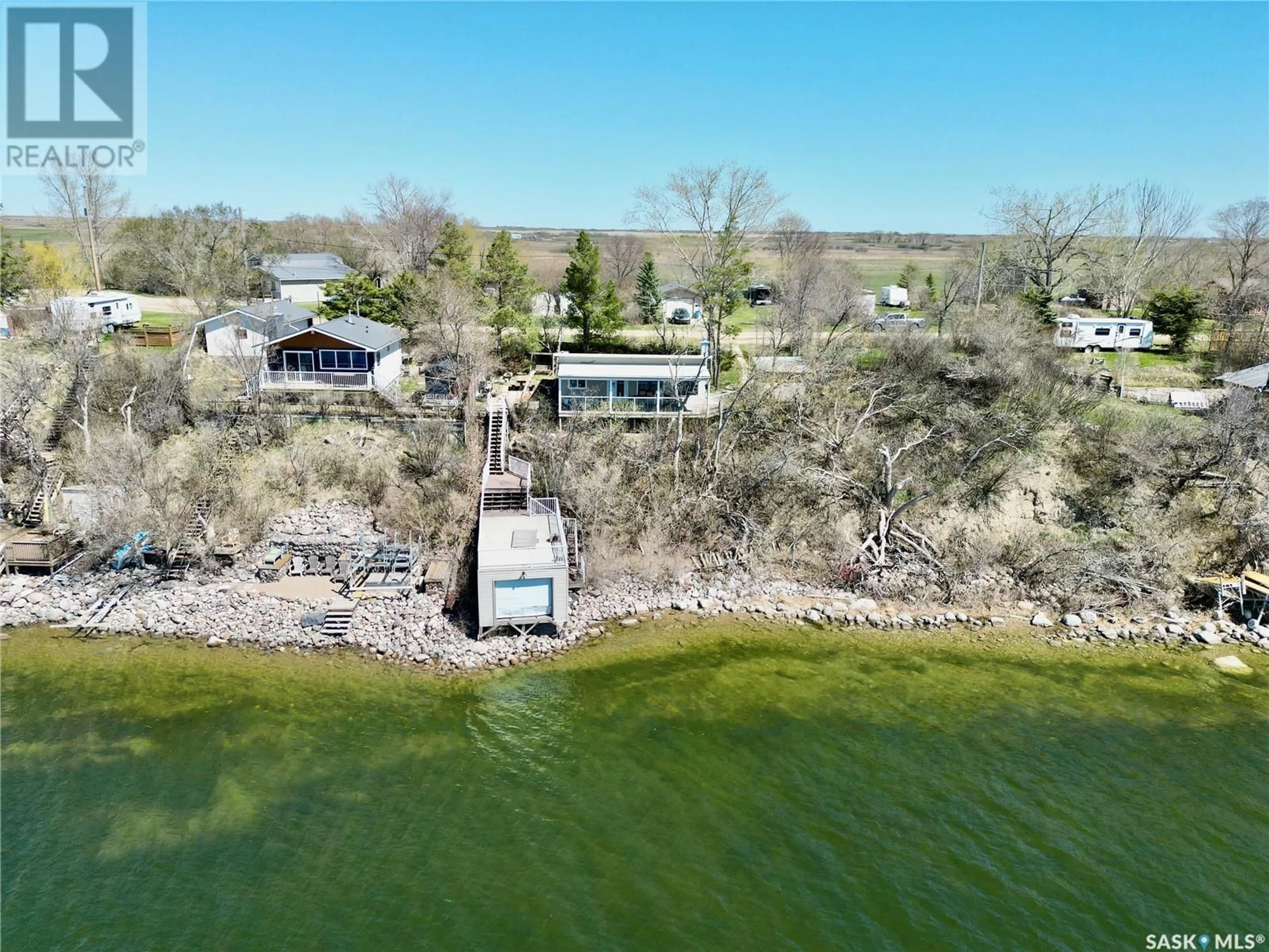 A pic from outside/outdoor area/front of a property/back of a property/a pic from drone, water/lake/river/ocean view for 424 LAST MOUNTAIN ROAD, Spring Bay Saskatchewan S0G4L0