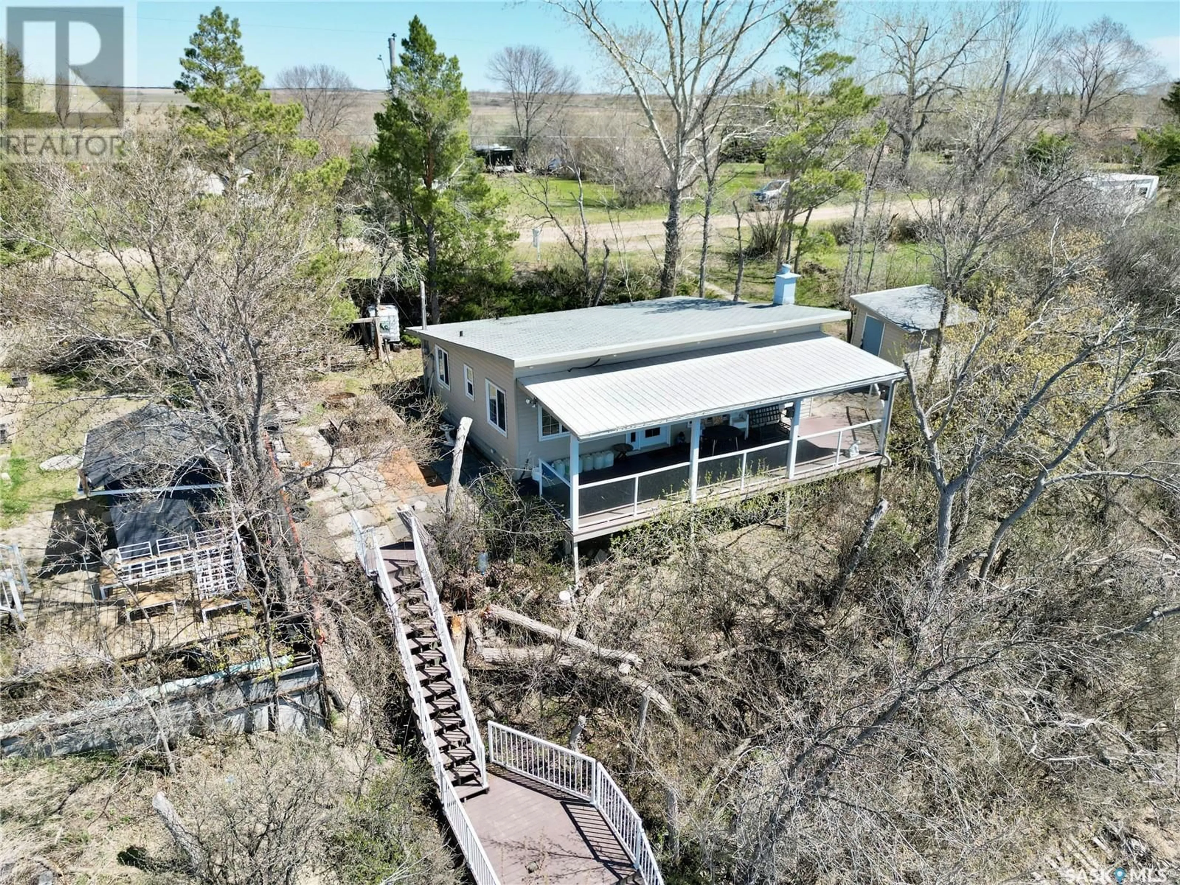 A pic from outside/outdoor area/front of a property/back of a property/a pic from drone, unknown for 424 LAST MOUNTAIN ROAD, Spring Bay Saskatchewan S0G4L0