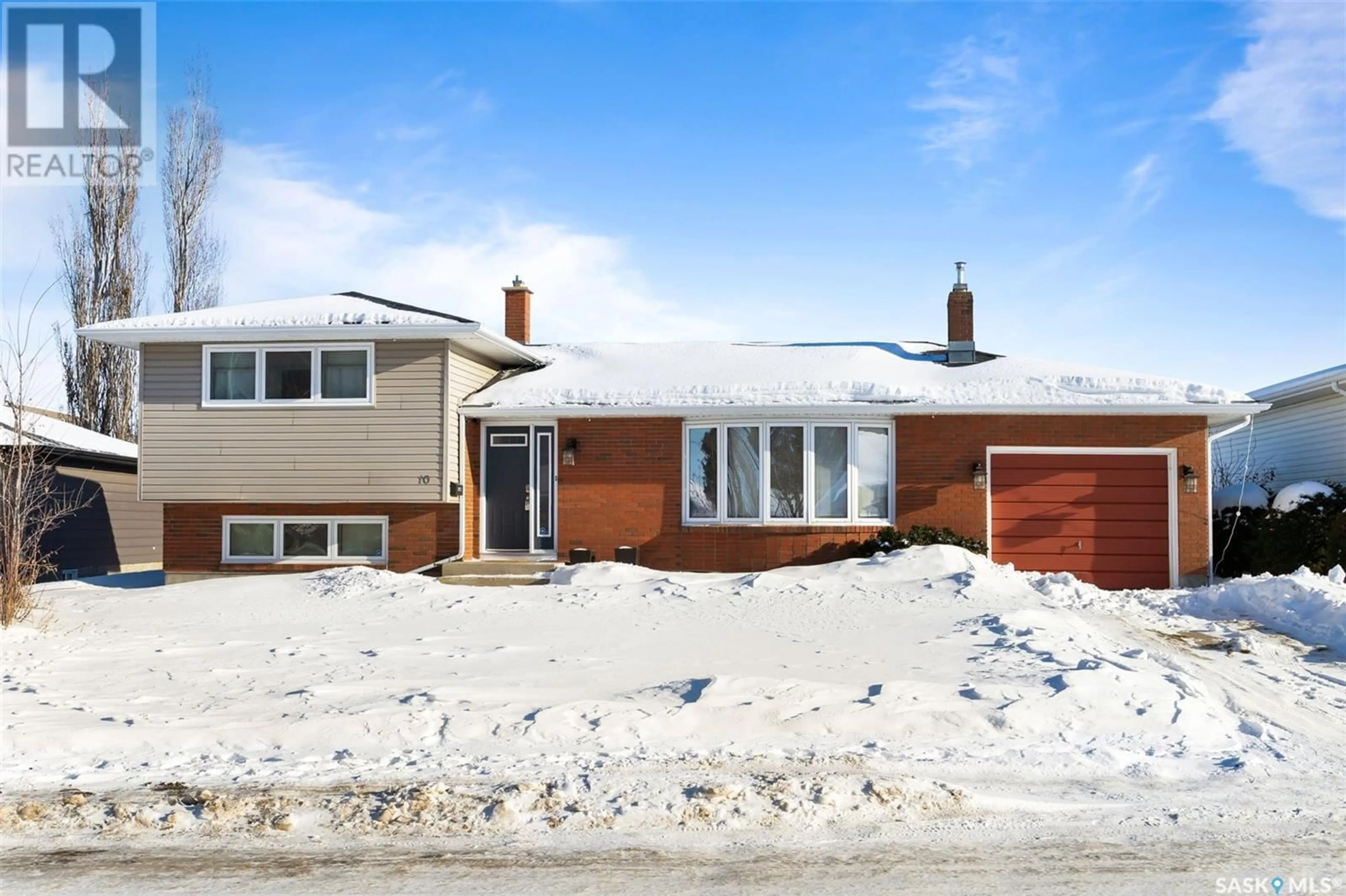 Home with brick exterior material, street for 10 Wheaton CRESCENT, Regina Saskatchewan S4S2Z2