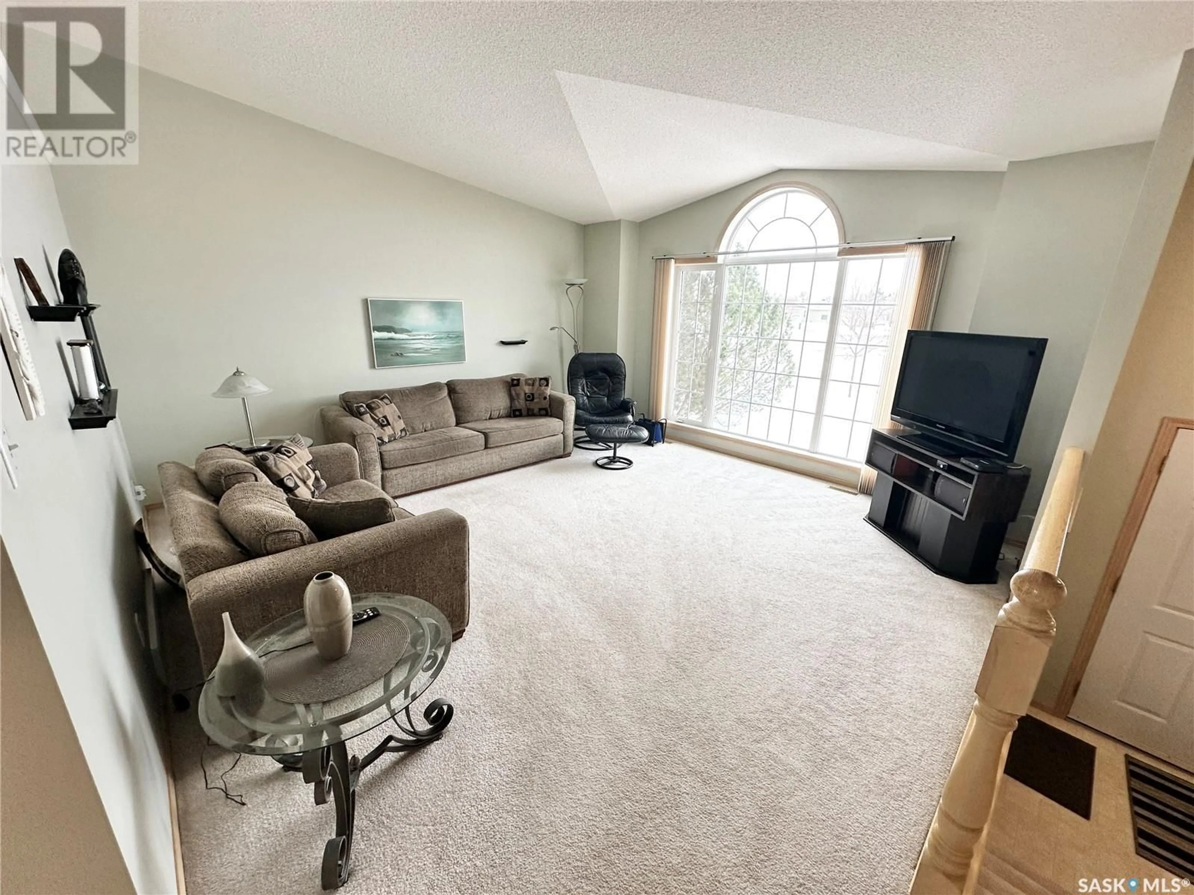 Living room with furniture, unknown for 21 Campbell CRESCENT, Weyburn Saskatchewan S4H3M3