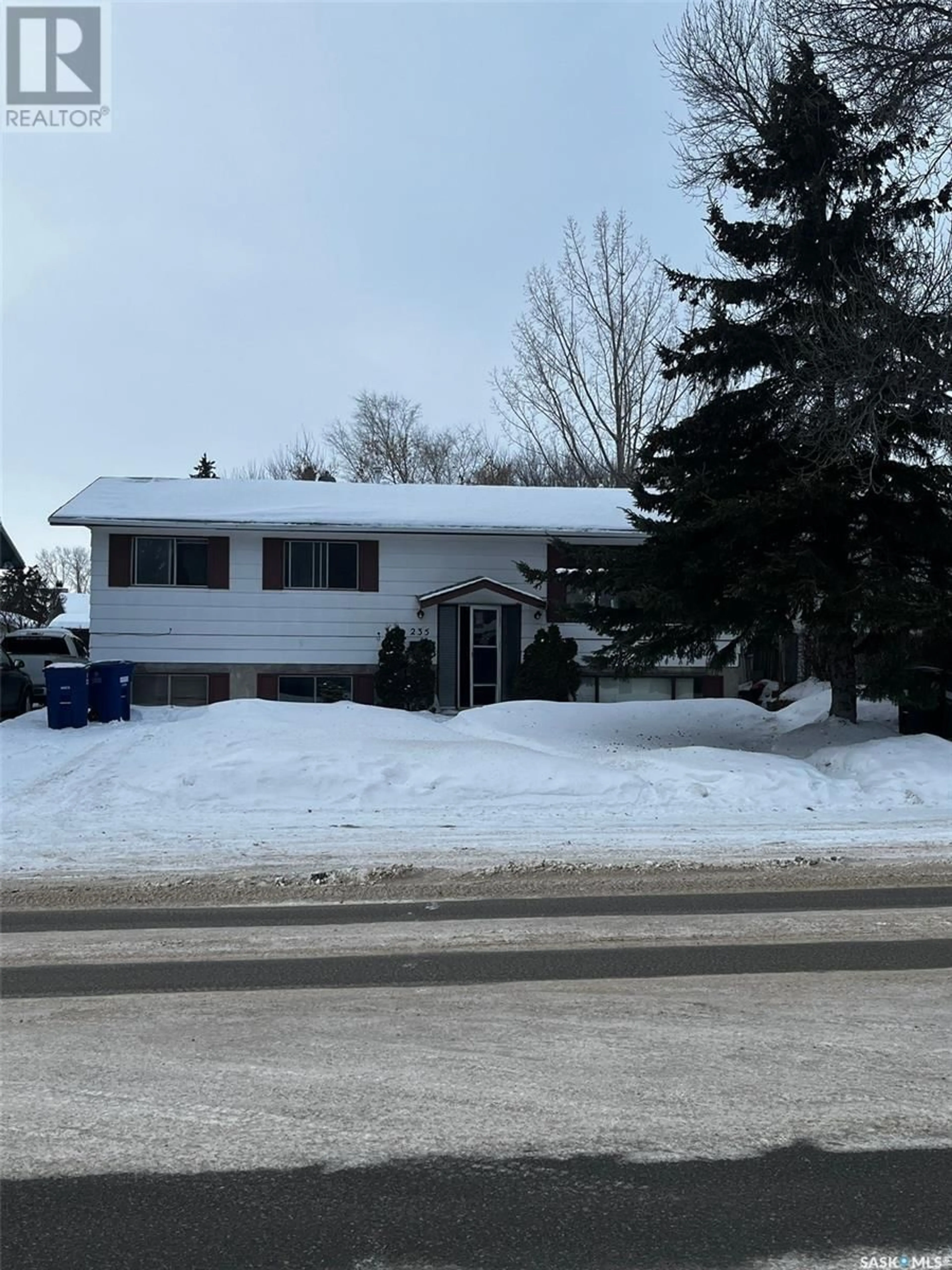 Home with vinyl exterior material, street for 235 Forrester ROAD, Saskatoon Saskatchewan S7M4K2