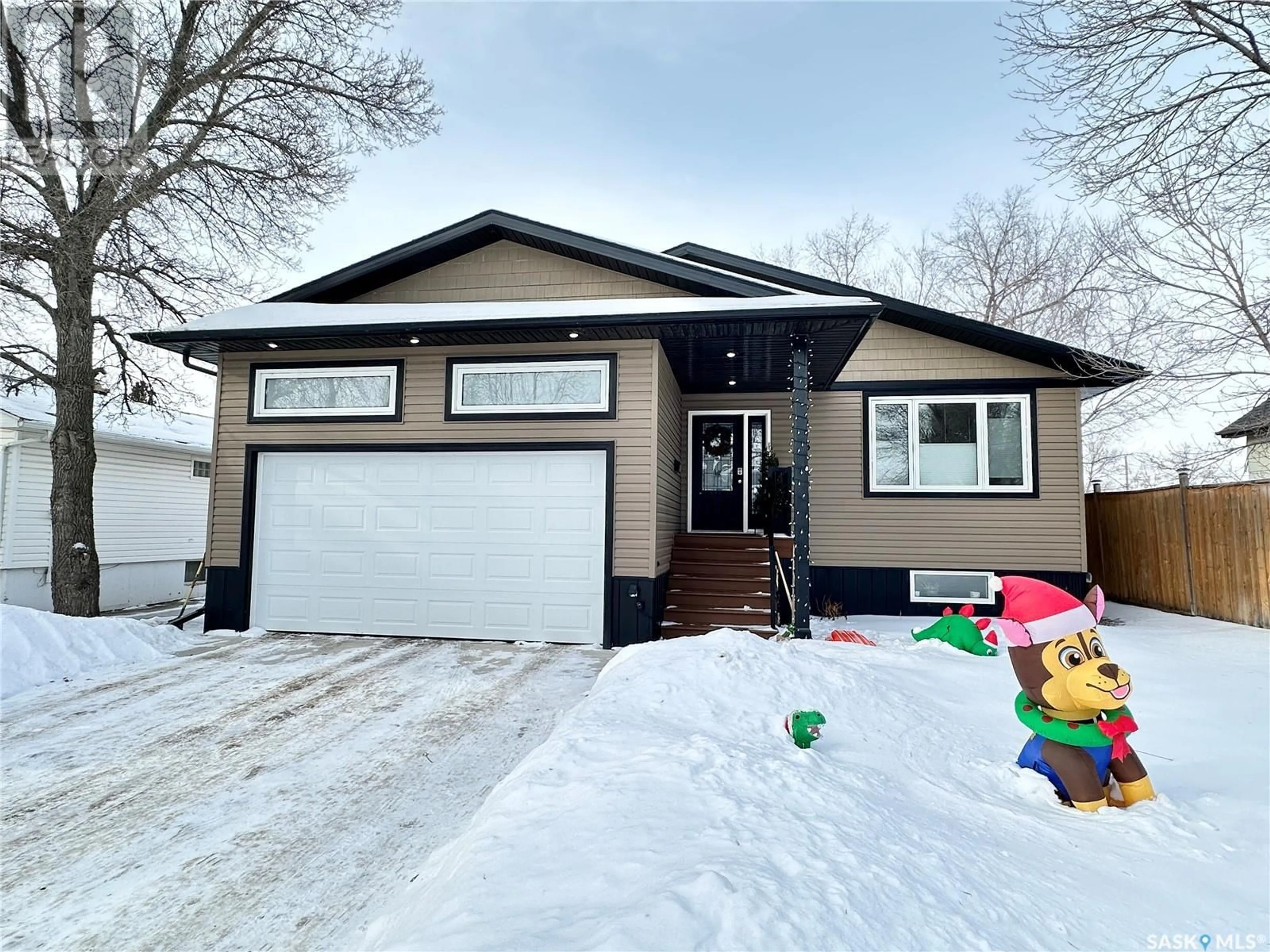 Home with vinyl exterior material, street for 43 9th STREET, Weyburn Saskatchewan S4H1E6