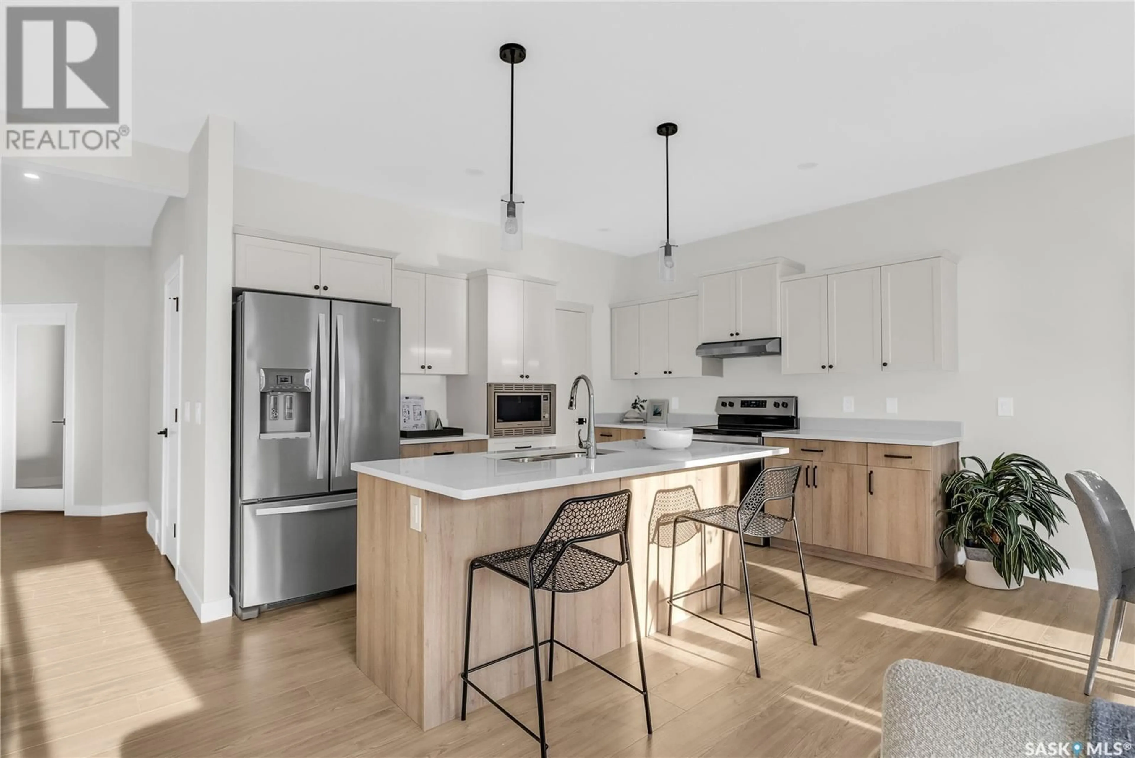 Open concept kitchen, unknown for 110 Prasad UNION, Saskatoon Saskatchewan S7V1L3