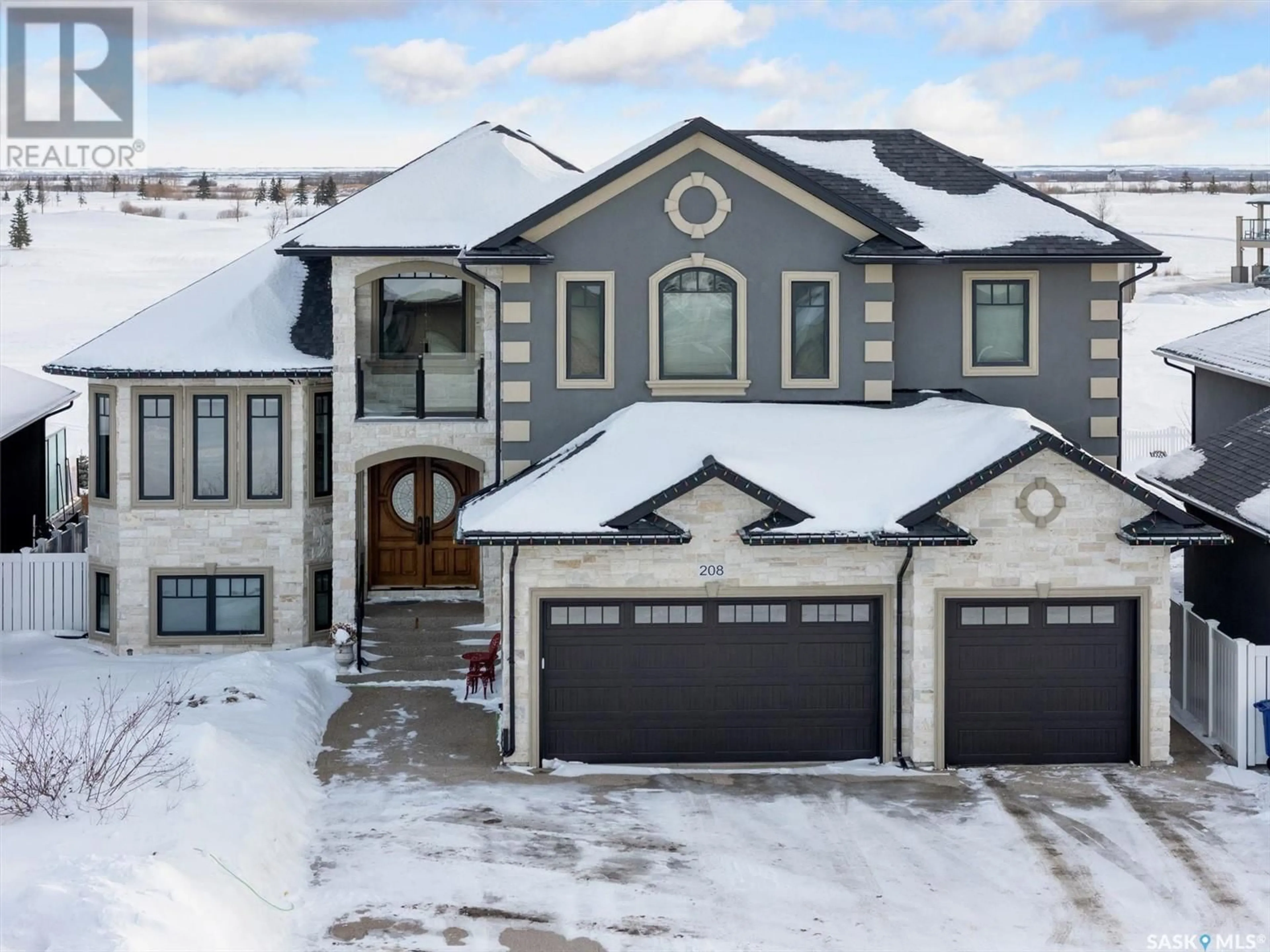 A pic from outside/outdoor area/front of a property/back of a property/a pic from drone, street for 208 Augusta DRIVE, Warman Saskatchewan S0K4S1