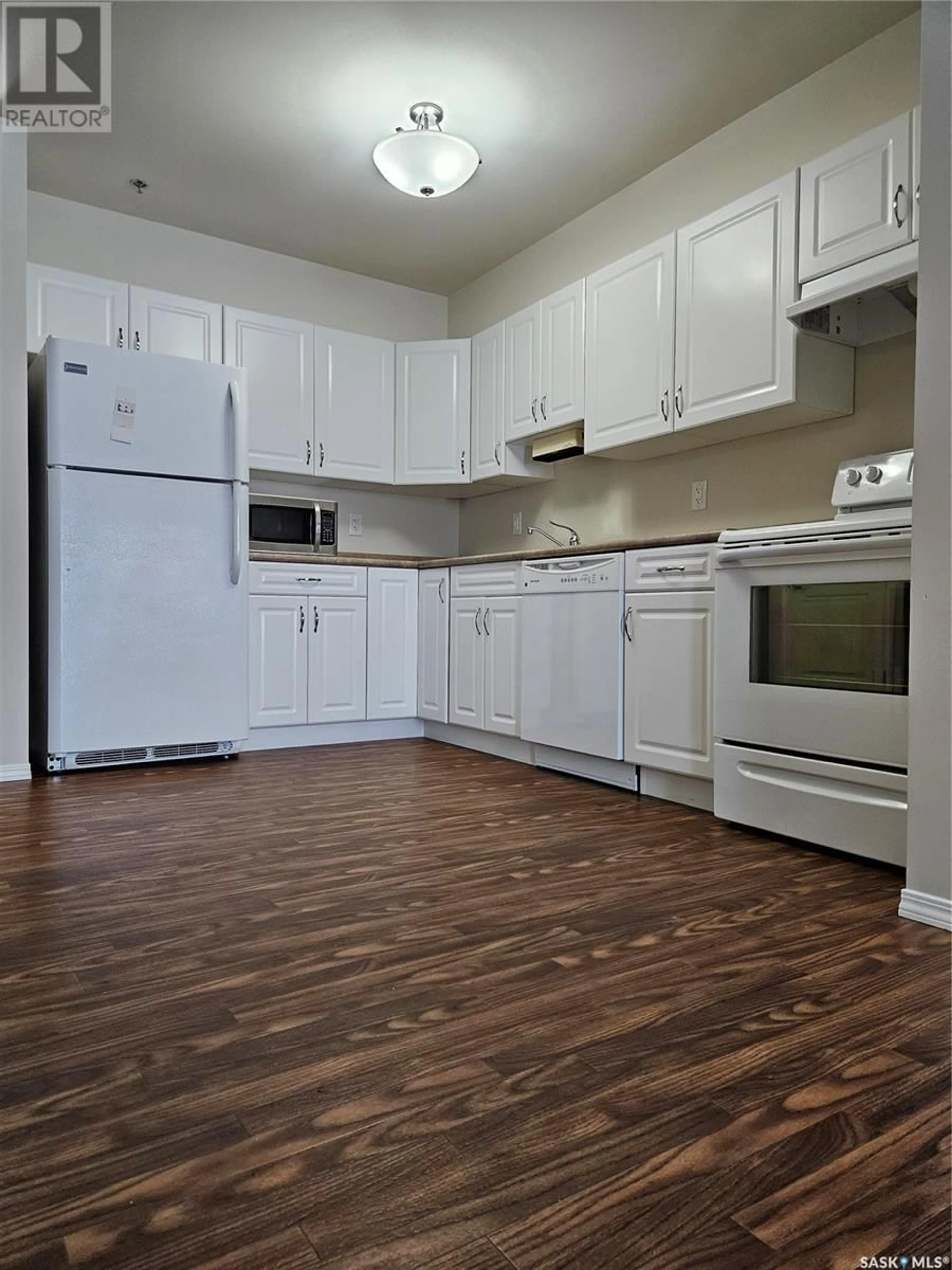 Standard kitchen, wood/laminate floor for 202 601 110th AVENUE, Tisdale Saskatchewan S0E1T0