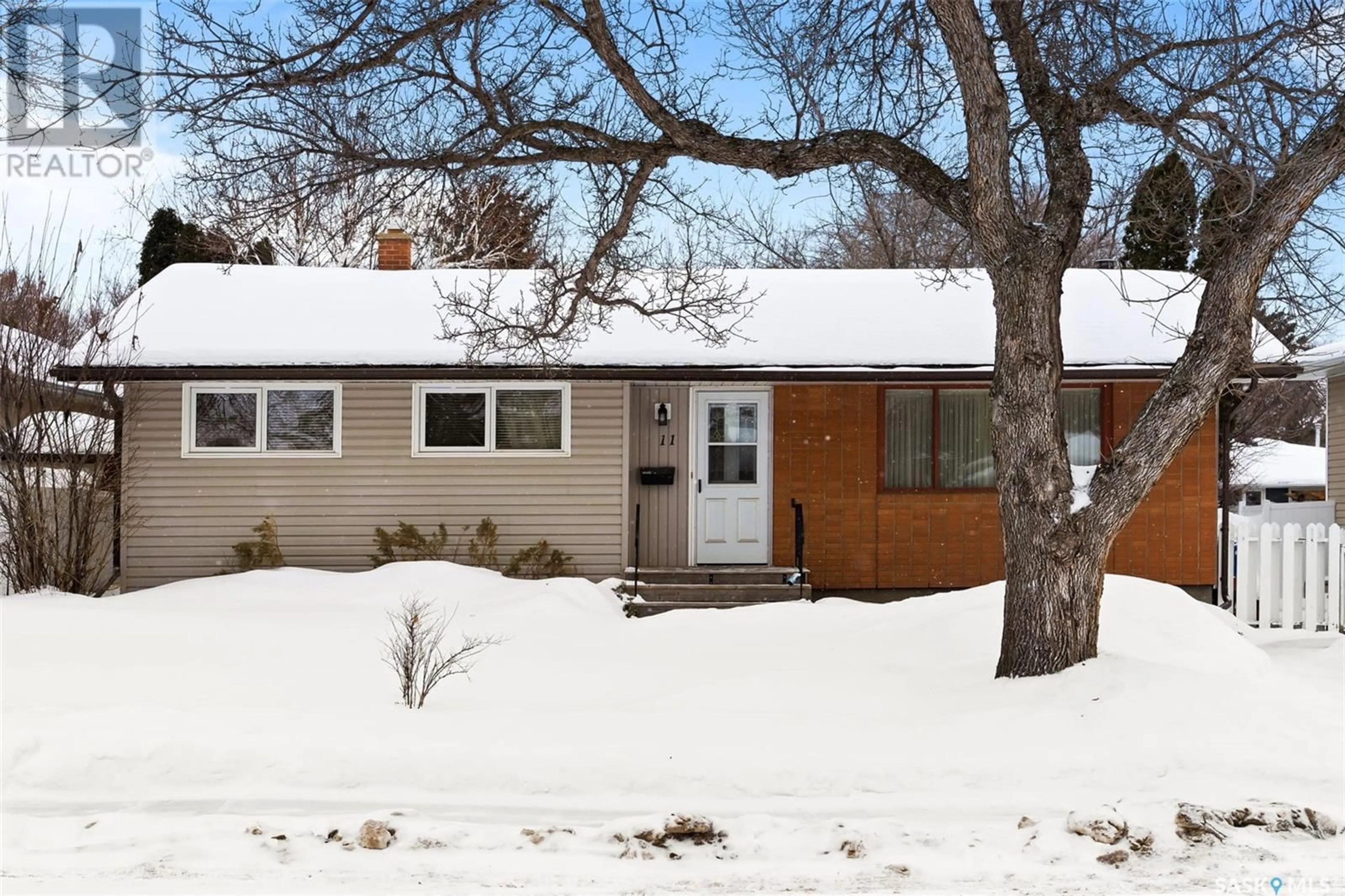 Home with vinyl exterior material, street for 11 Willoughby CRESCENT, Regina Saskatchewan S4R5K3