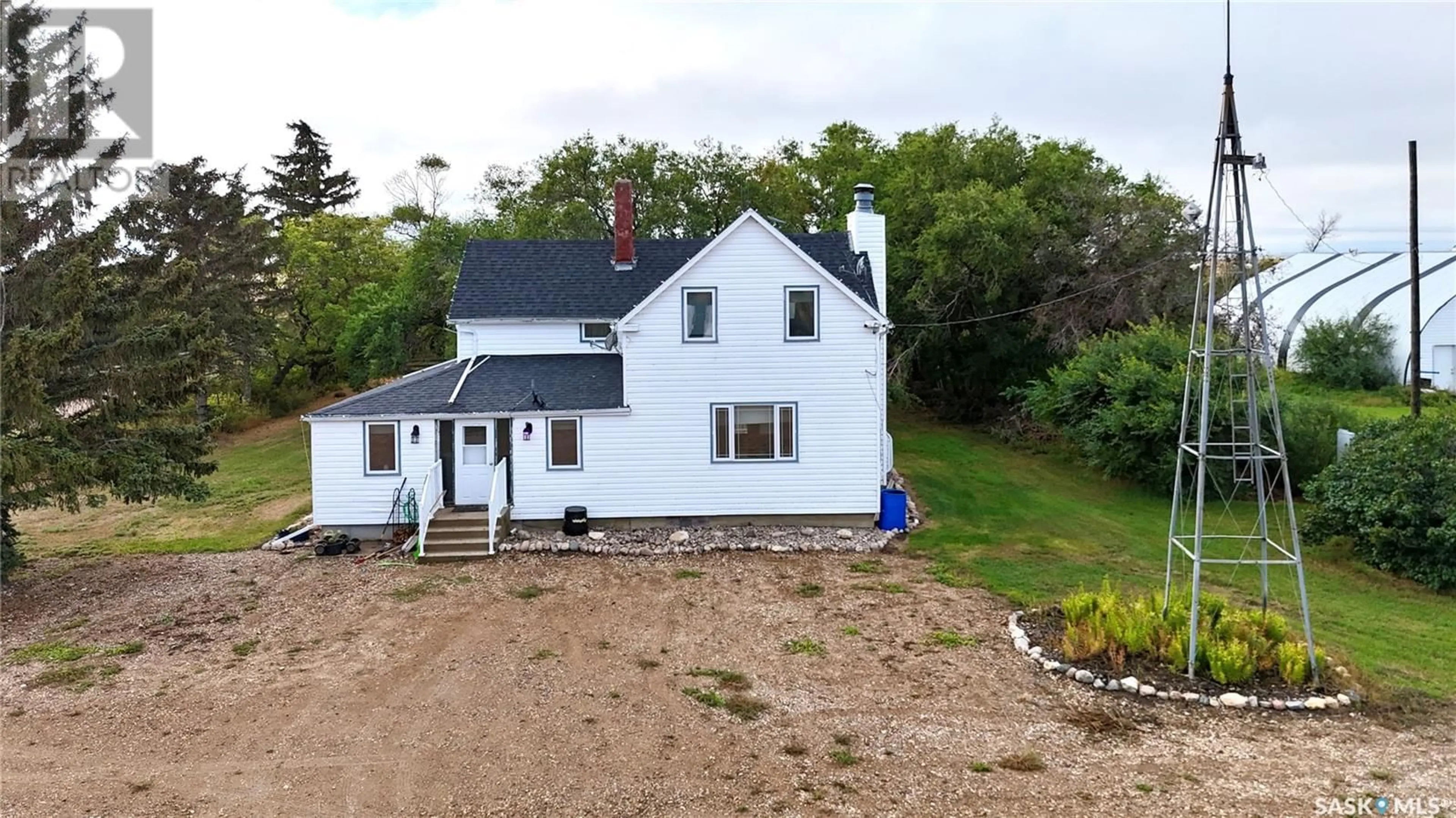 A pic from outside/outdoor area/front of a property/back of a property/a pic from drone, unknown for Davidson SK Acreage, Arm River Rm No. 252 Saskatchewan S0G1A0