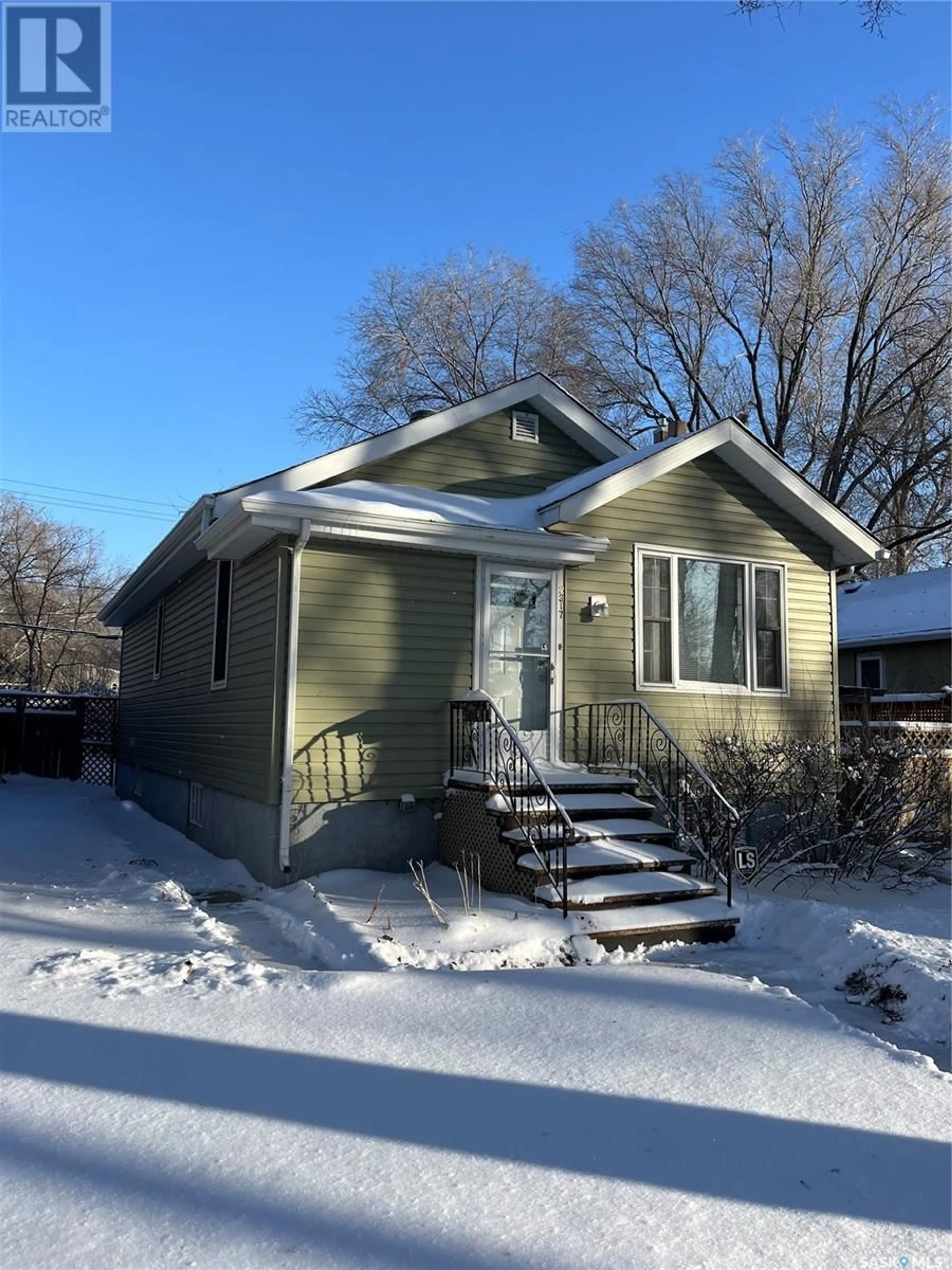 Home with vinyl exterior material, street for 2317 Elphinstone STREET, Regina Saskatchewan S4T3P2