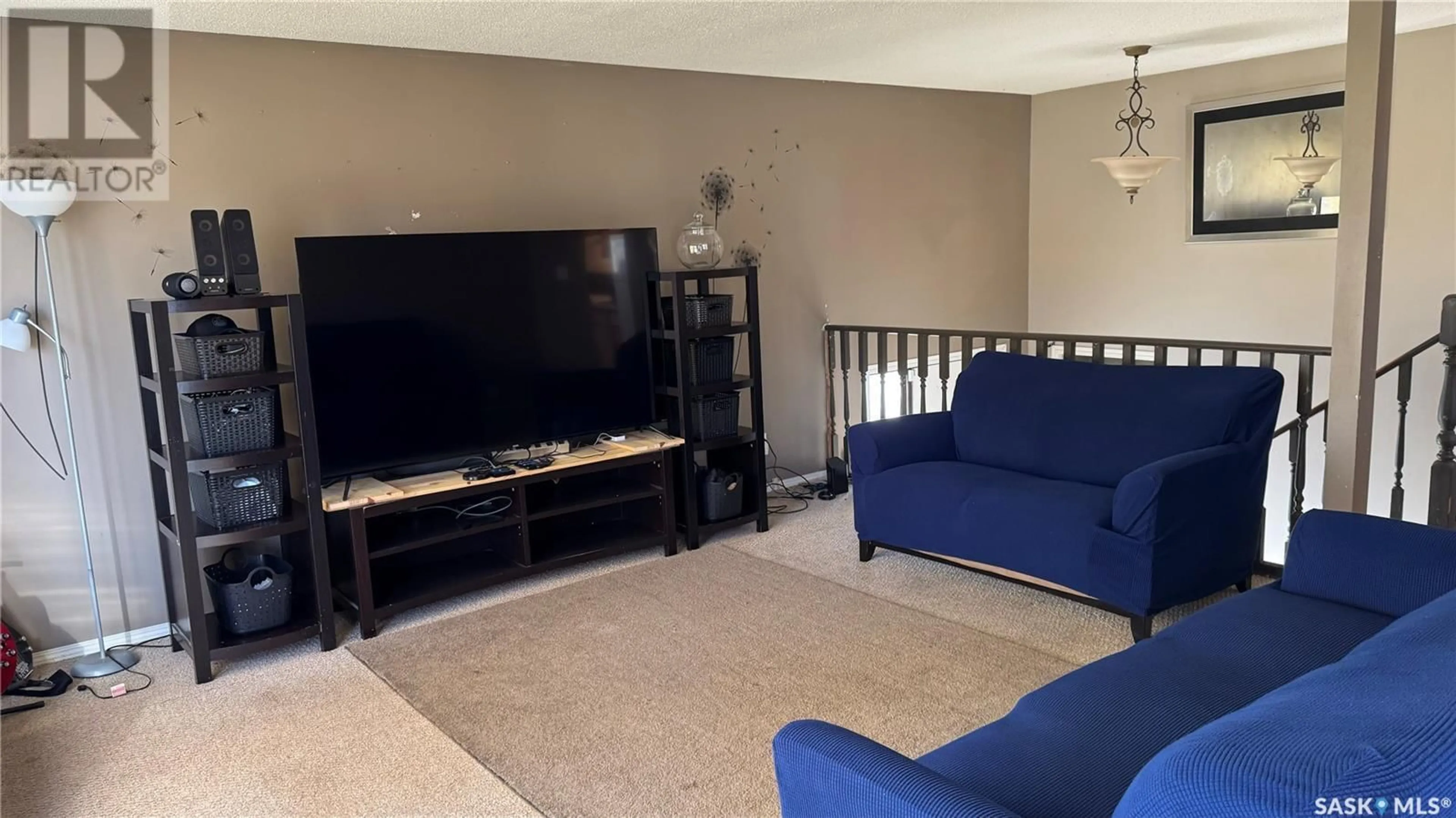 Living room with furniture, unknown for 249 Macdowall CRESCENT, Prince Albert Saskatchewan S6V6N5