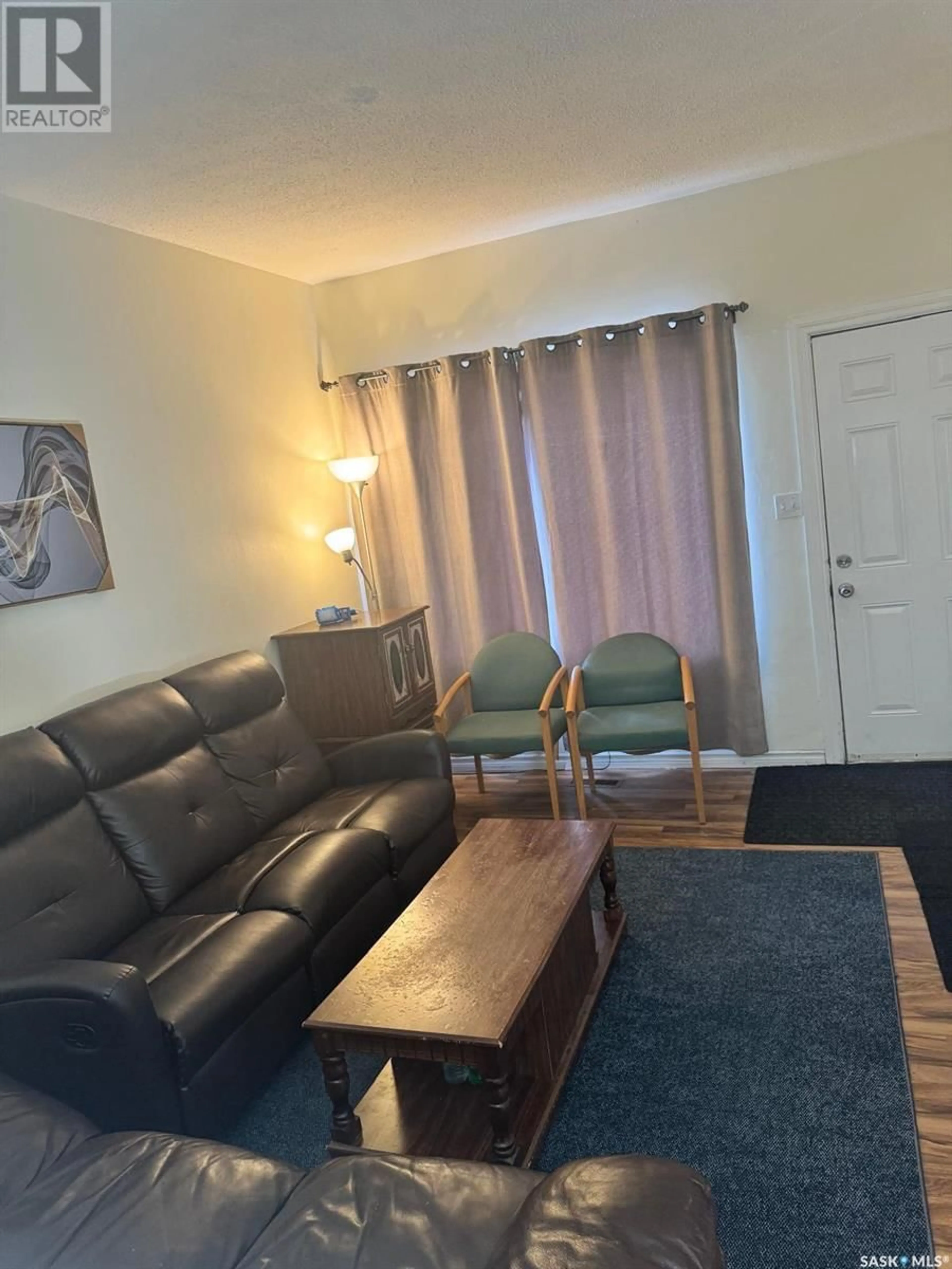 Living room with furniture, unknown for 1447 Rae STREET, Regina Saskatchewan S4T2C5